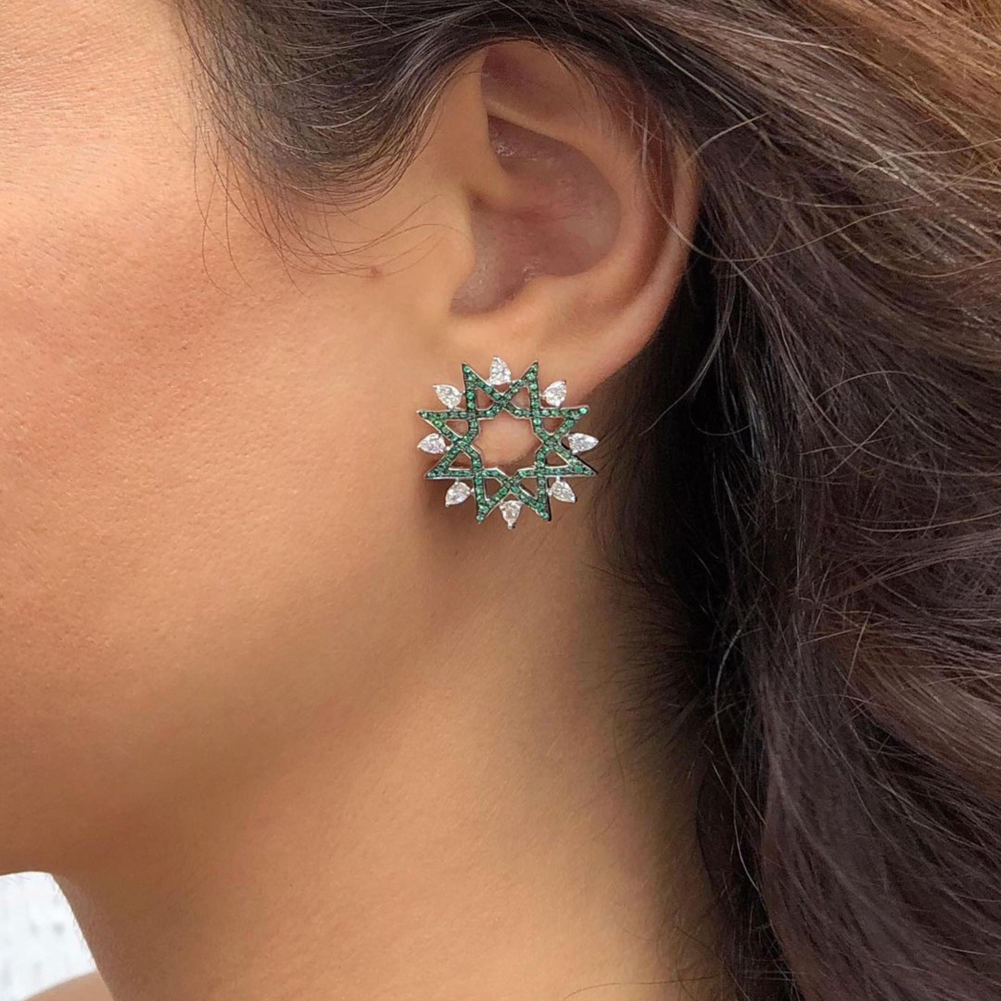 18kt white gold earrings with diamond pears and emerald pavé from Ralph Masri's Arabesque Deco collection, inspired by Middle Eastern patterns and motifs infused with an Art Deco touch.

Available in yellow, rose or white gold.

Push backs for