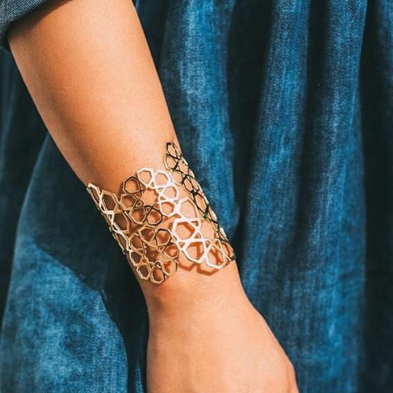 18kt gold cuff from Ralph Masri's Arabesque collection, inspired by Middle Eastern patterns and motifs. 

Available in yellow, rose or white gold. Can be made in any wrist size.