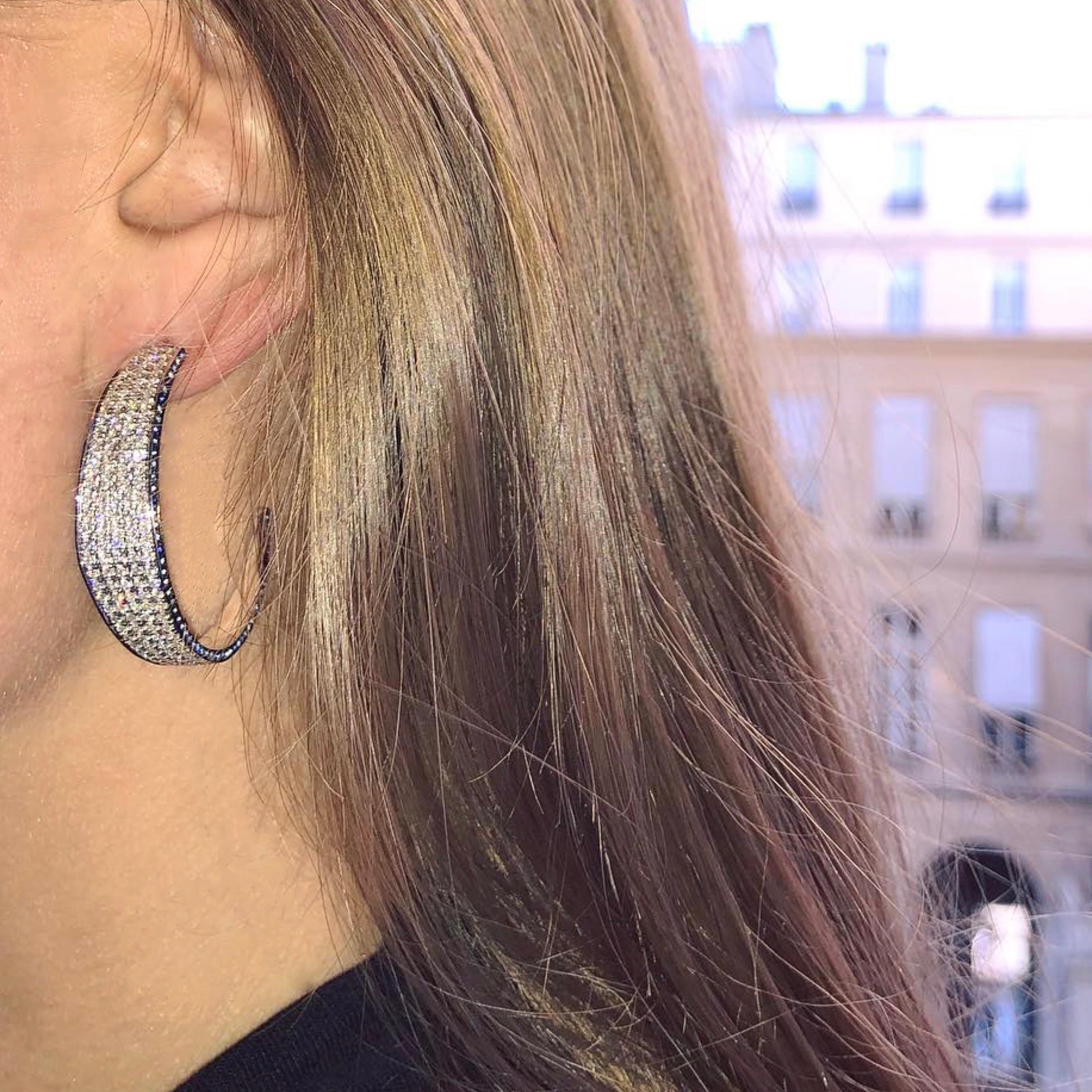 18kt white gold hoops with diamonds and sapphires from Ralph Masri's Modernist collection, inspired by mid-century Modernist architecture with an emphasis on minimalist shapes and silhouettes.

Available in yellow, rose or white gold.

Push backs