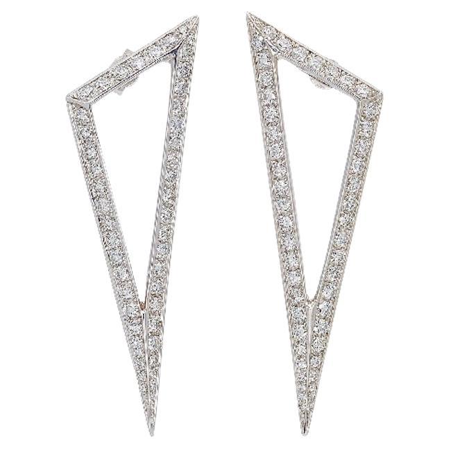 Keep your look on point with these triangle form earrings. The refined shape sparkles with light catching diamonds. 

18K White Gold
Diamond TCW is 2.20
Friction post and back closure
Length is 2 inches and width is 0.65 inches.