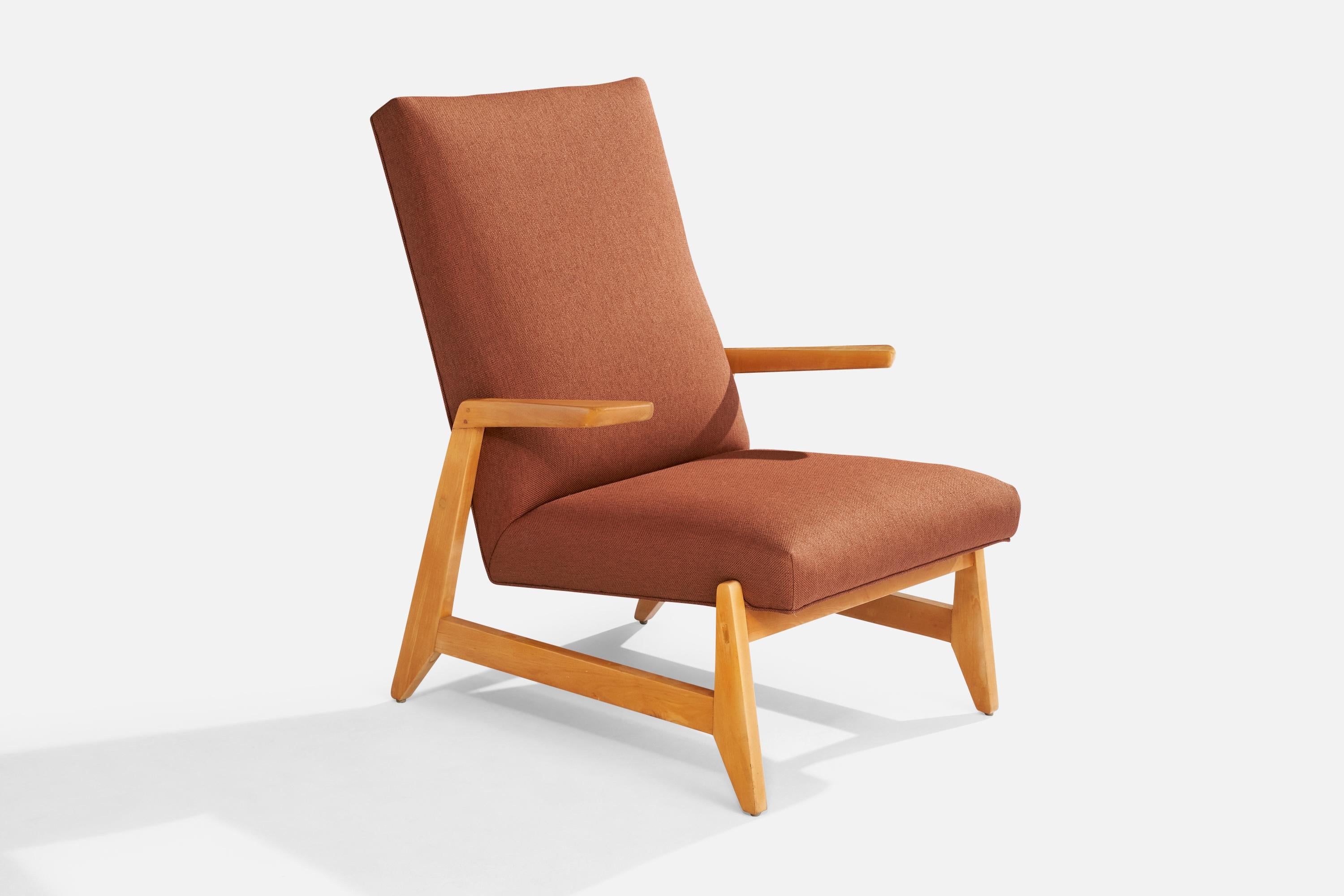 A wood and red fabric lounge chair designed by Ralph Rapson and produced by Knoll, USA, c. 1948.

Dimensions: 39.7” H x 28.25” W x 33.25” D

Seat Height: 15.5”

All upholstered furniture can be reupholstered upon request for an additional fee. Lead