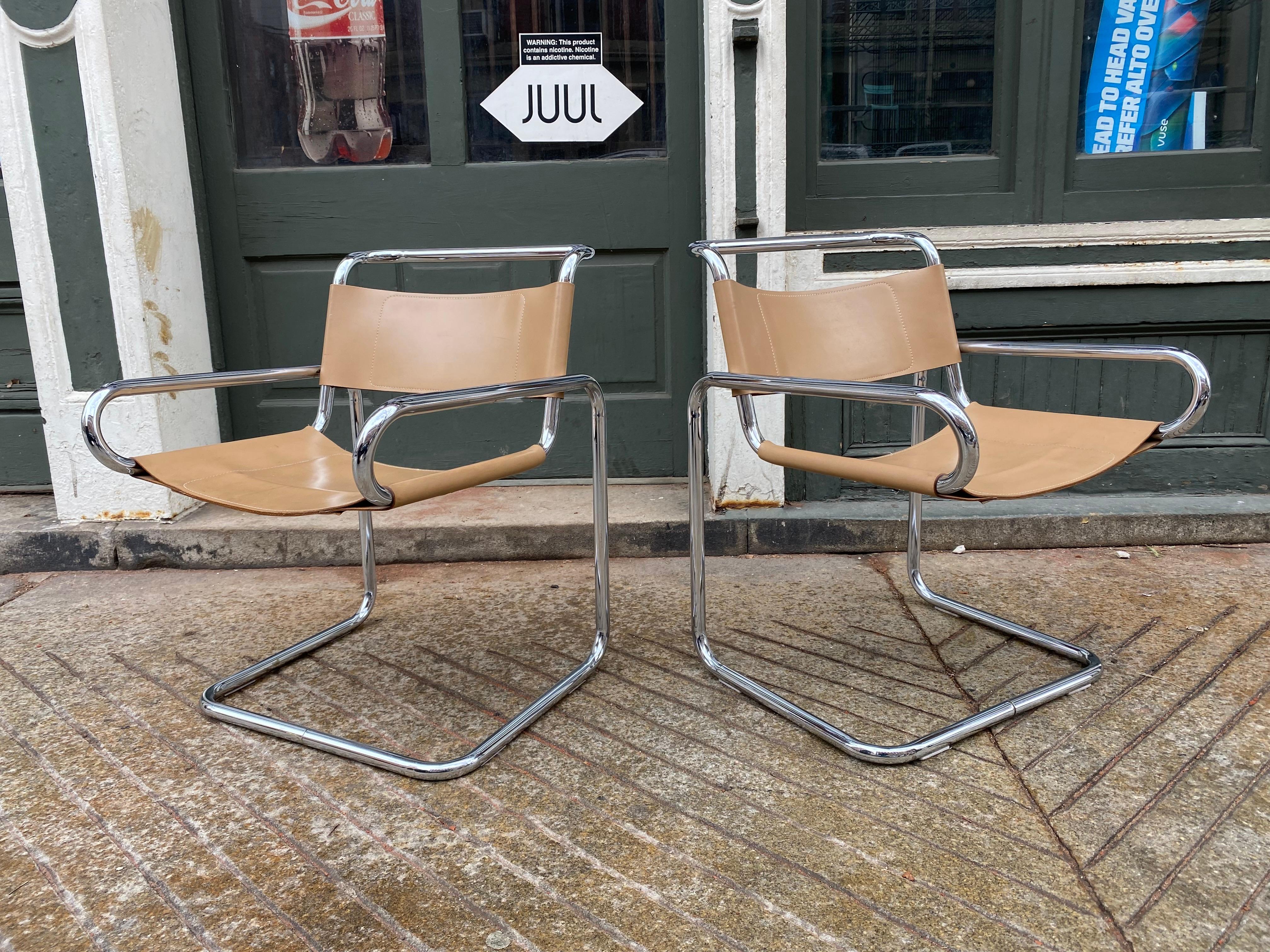 Ralph Rye Cantilevered Sling Chairs.  Camel Slings hanging on Chrome Tubular Frame. 6 chairs total available! Were sold through Dunbar Furniture and Krueger Furniture.  Can be used as large Dining Chairs or perfect Lounge Chairs!  Sold in Pairs! 