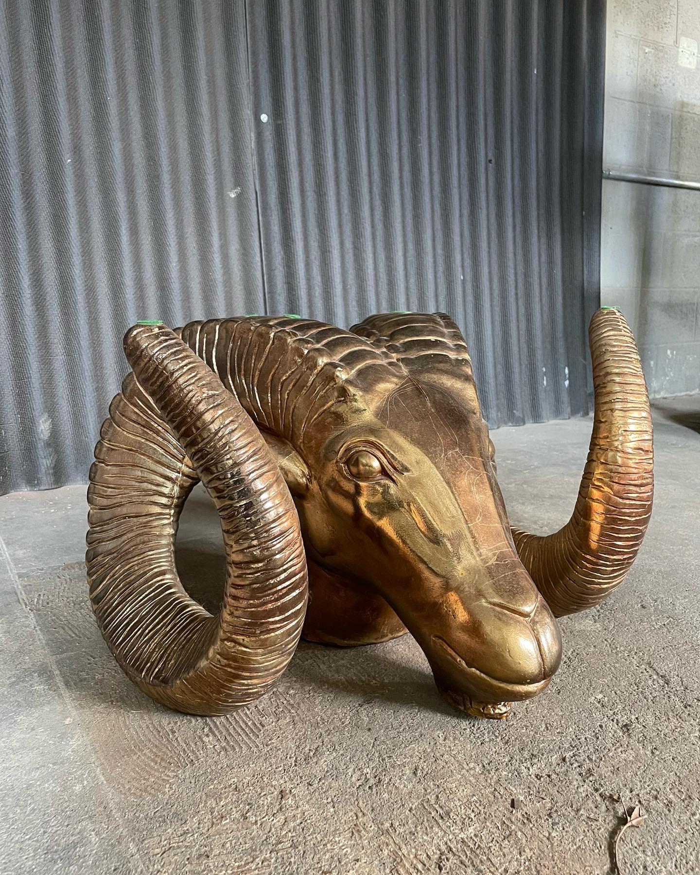 This came from the home of a big game hunter. It is what it is! But coming back to the States, he filled his home with pieces like this. I met his wife. She approved.
This table is so totally cool! Not sure what the material is but, if I had to