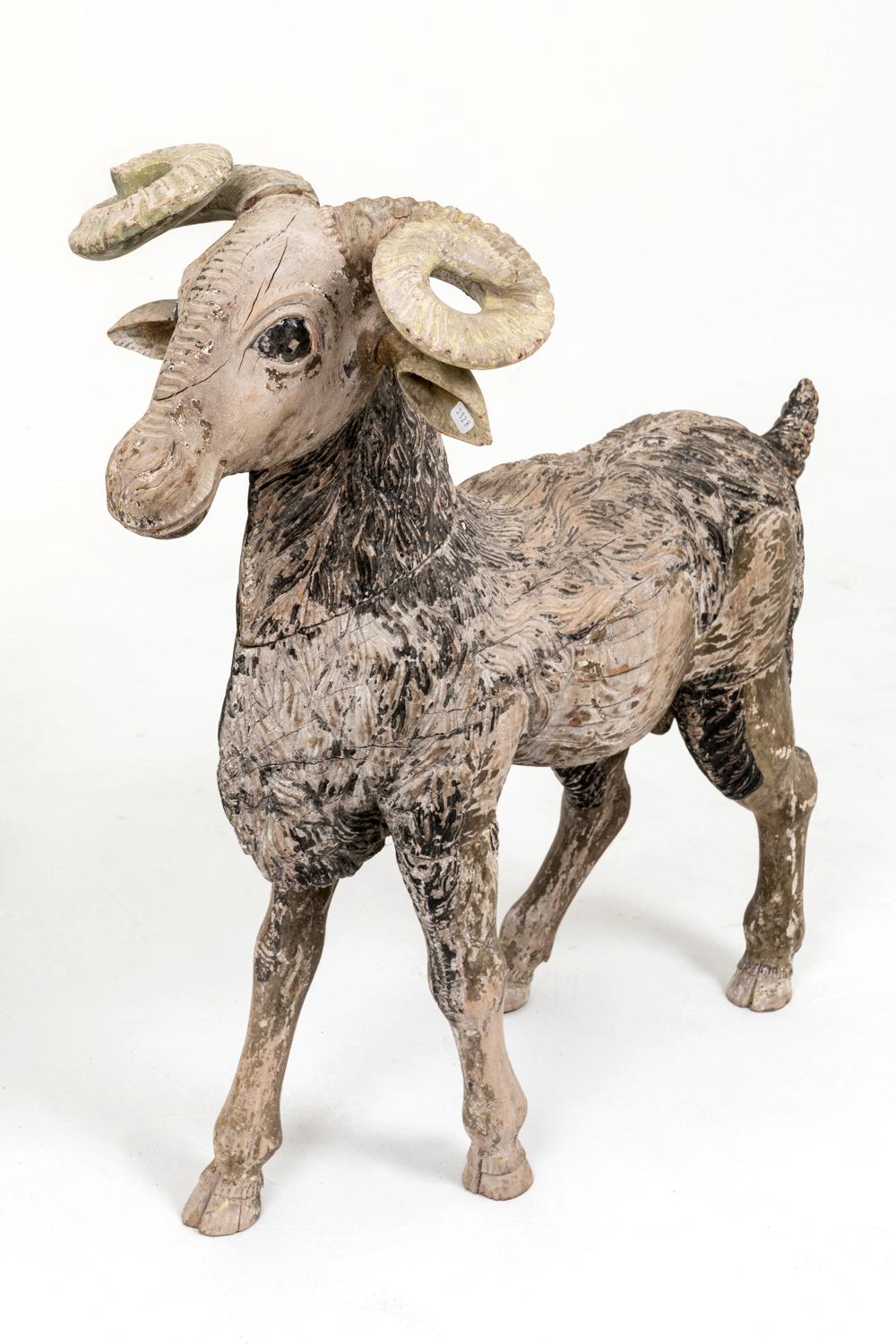 Ram in sculpted and painted wood, in grey color with lighter wounded horns.

Work from the 19th century.

Wear consistent with age and use.

Can be paired with an antelope.