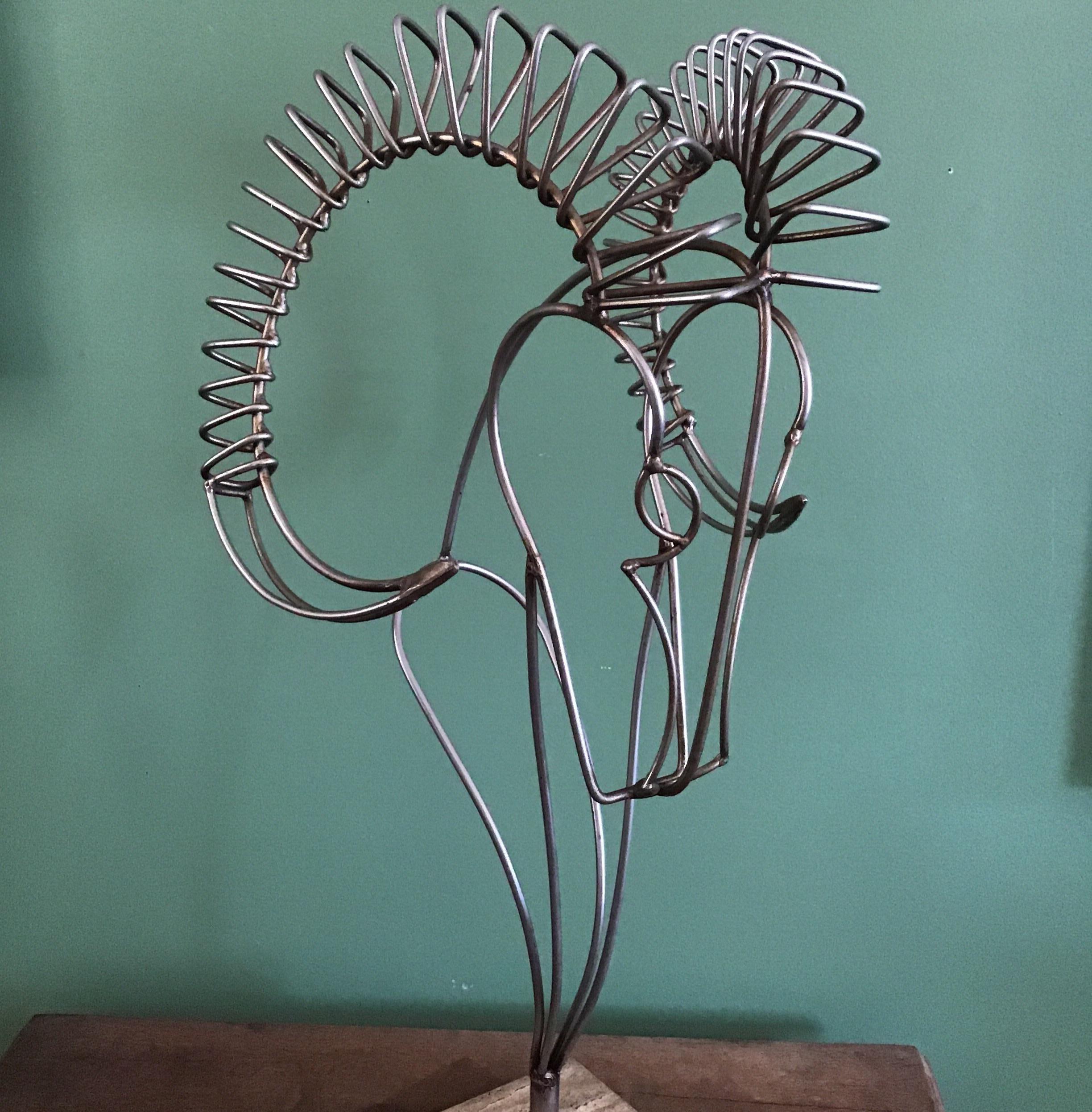 Handmade metal sculpture on marble base size 2 H x 7.75 W x 7.75