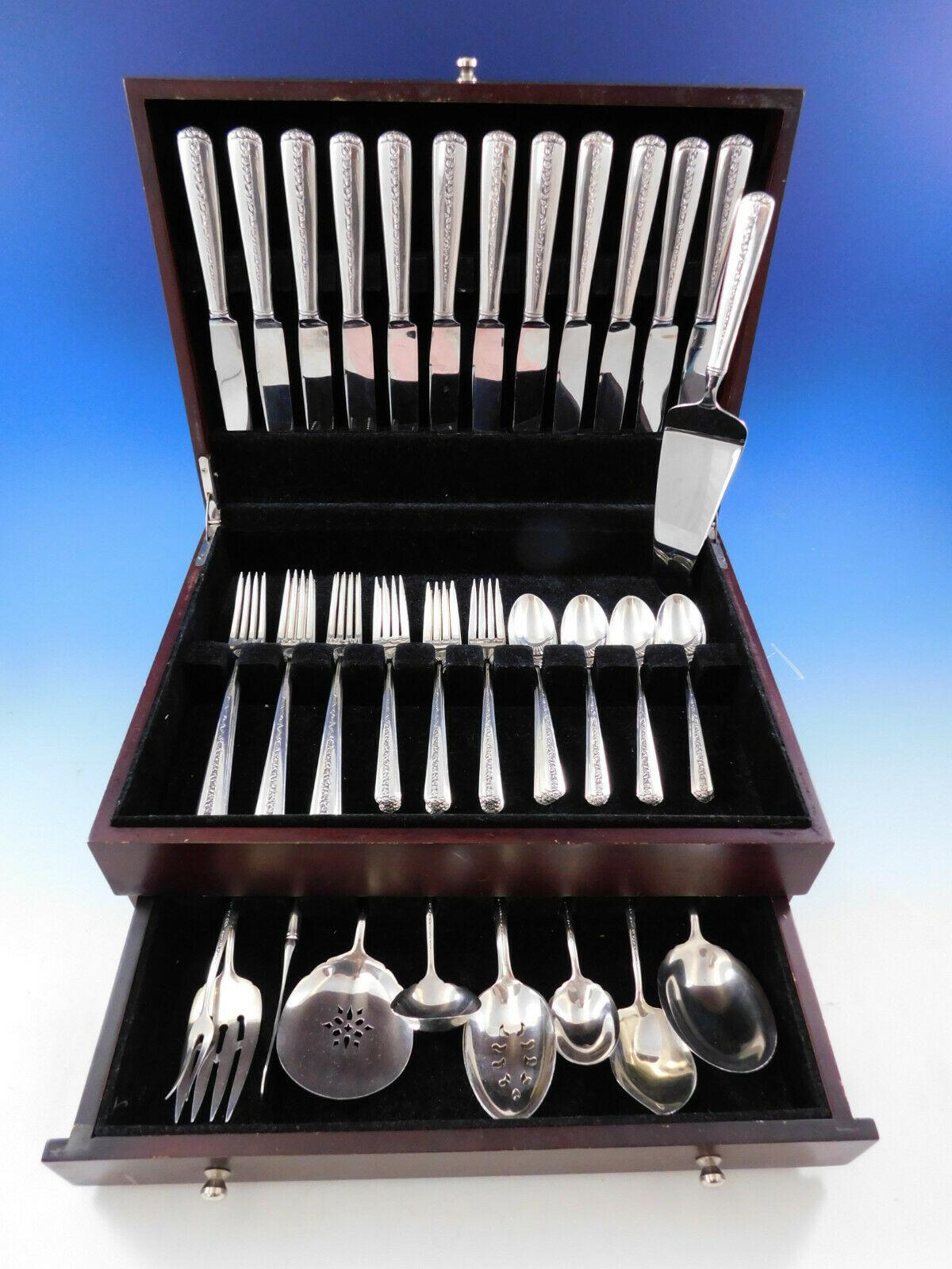 Dinner size Rambler Rose by Towle sterling silver flatware set, 59 pieces. This set includes:

12 dinner knives, 9 1/2