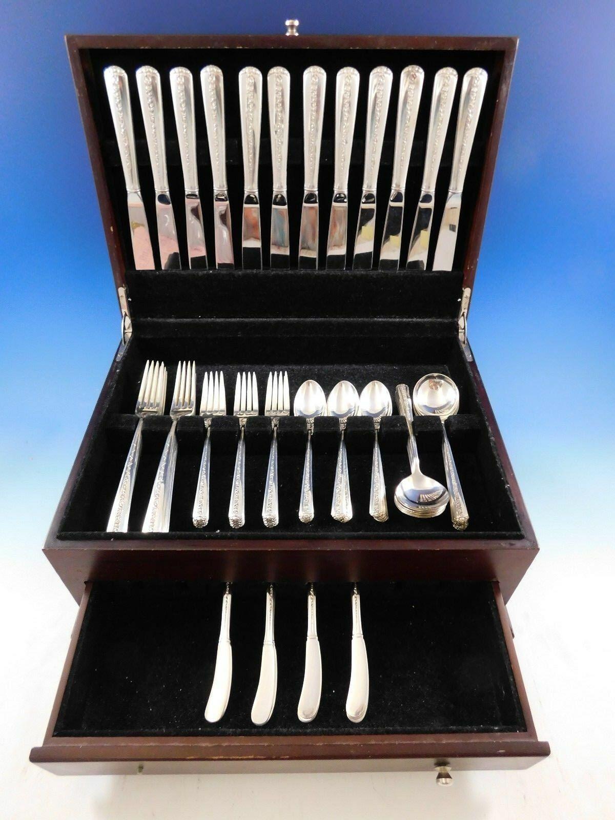 Highly polished sides with a trellis of rambling roses down the center and on the handle best describes the popular Rambler Rose pattern, first introduced by Towle in 1937.

Dinner size Rambler Rose by Towle sterling silver flatware set, 72 pieces.