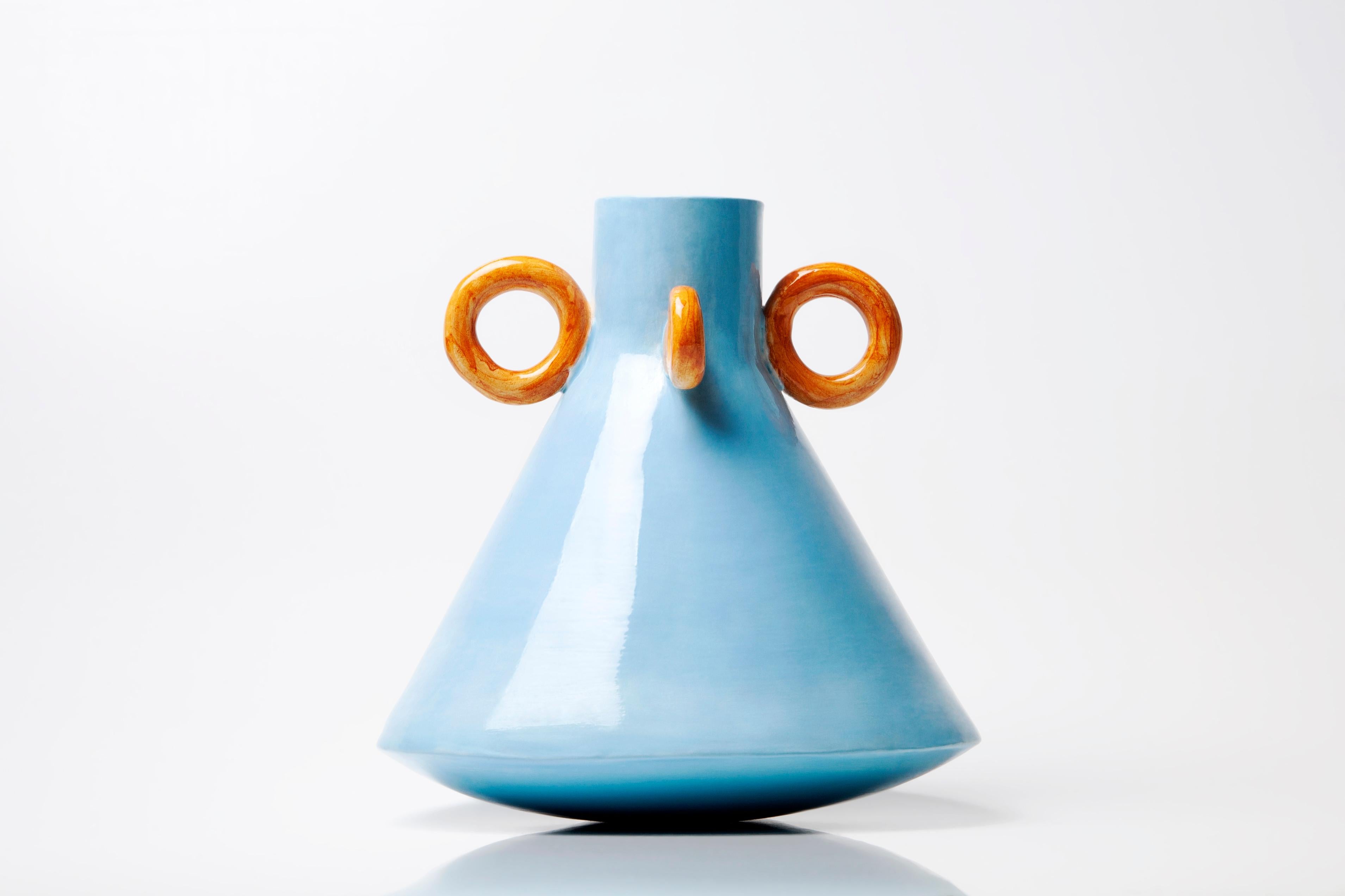 Ramina vase by Arianna De Luca
Dimensions: height 20 x diameter 20 cm 
Materials: ceramic 

Ramina is part of the Folcloristica series. A collection inspired by the mood and lifestyle of the Southern Italian villages. The vase revisits shapes