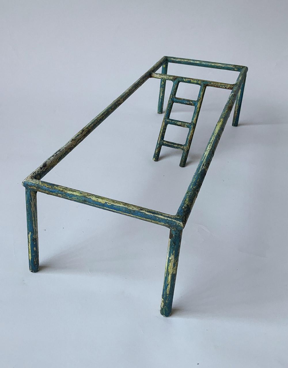 LARGE POOL is a unique painted iron, oxidized patina and wax finish sculpture by contemporary artist Ramon Enrich, dimensions are 11 × 49 × 15 cm (4.3 × 19.3 × 5.9 in). 
This unique sculpture is signed and comes with a certificate of authenticity.