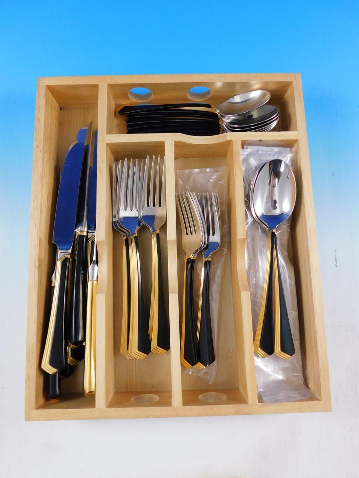 Art Deco style Ramona by Yamazaki Stainless Steel black handle with gold accent flatware set - 40 pieces. This estate set includes:

8 Knives, 9