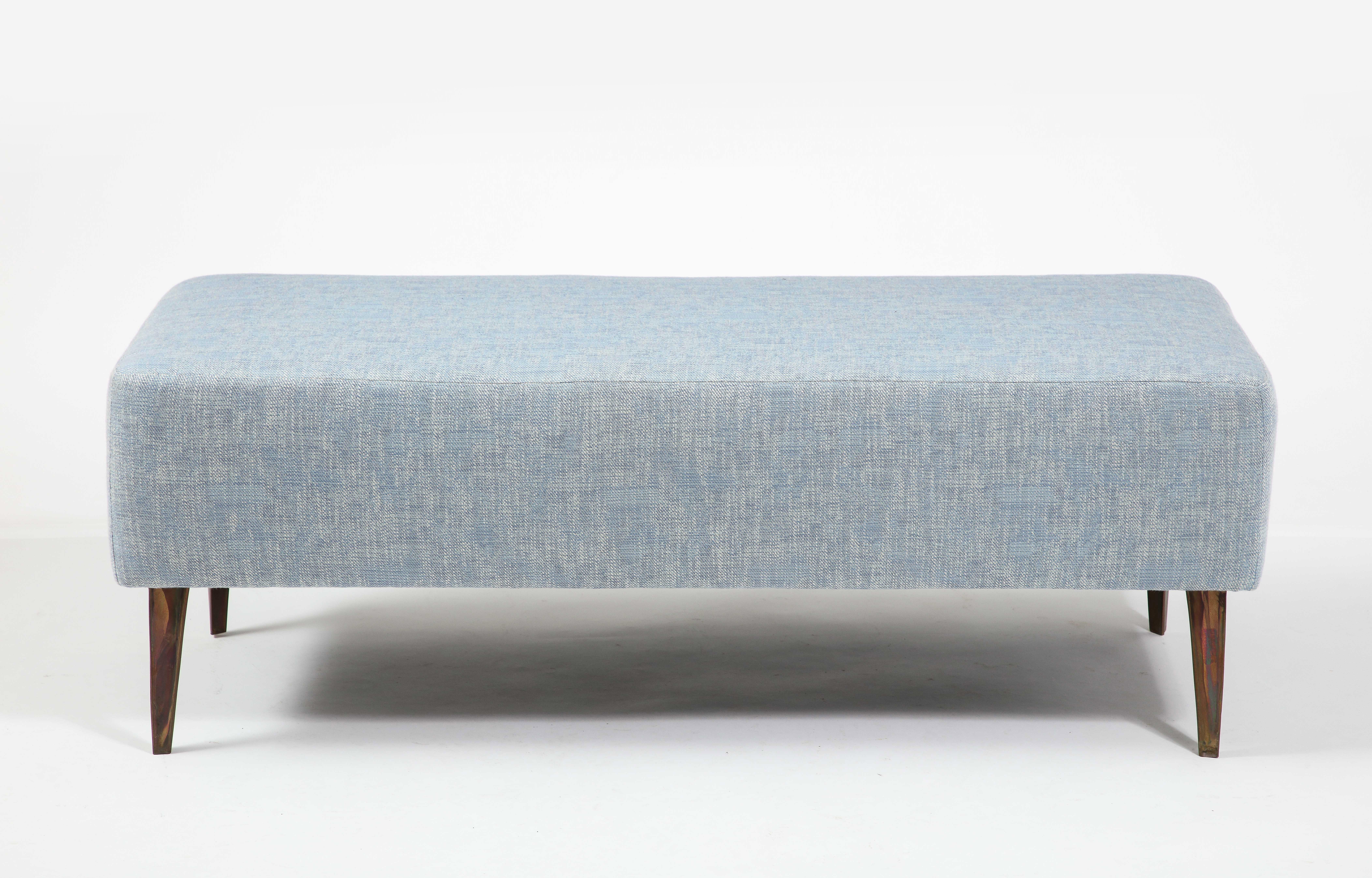 Blue Linen Upholstered bench on Bronze legs. Sold individually.
