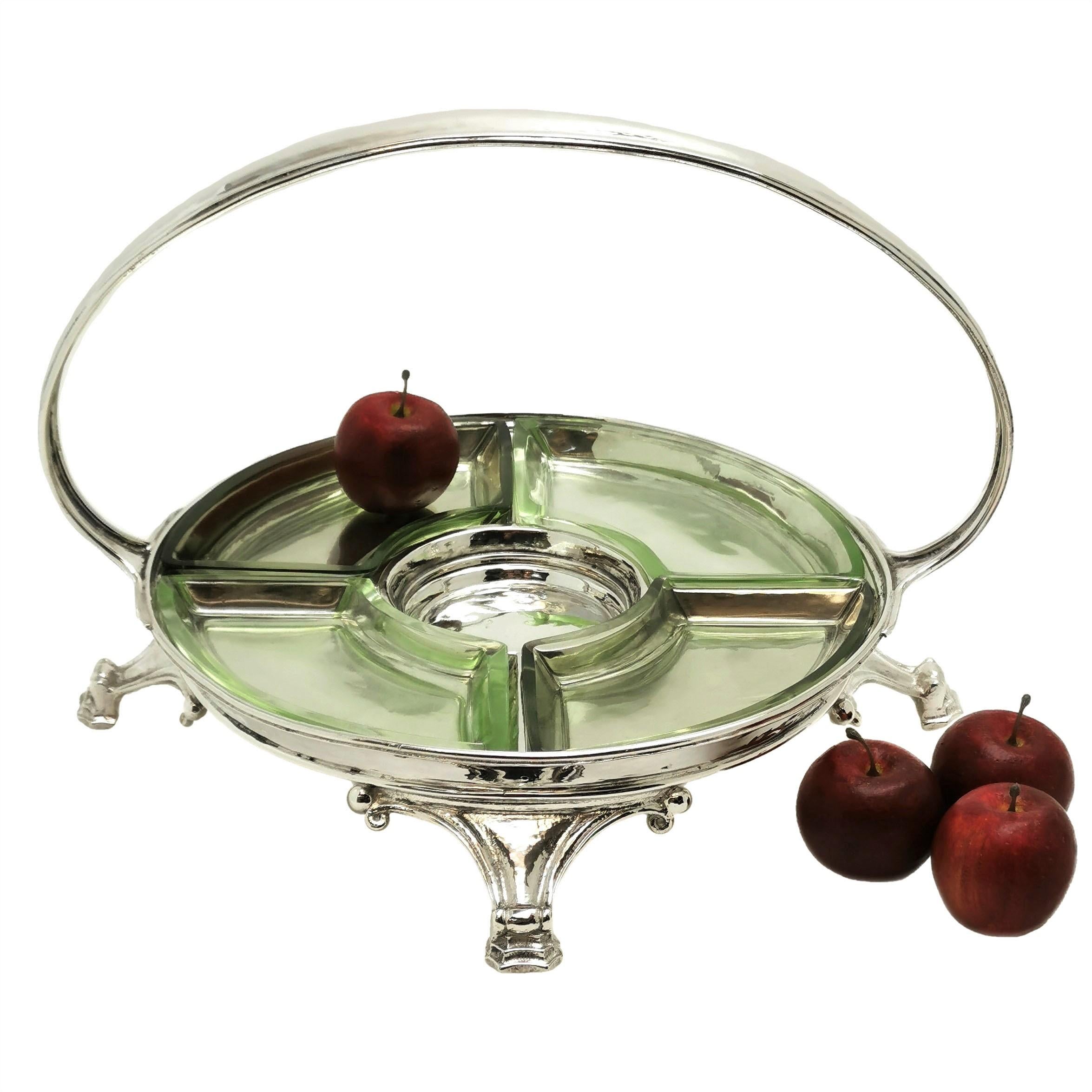 An elegant Hors d'oeuvre sterling silver Hors d'oeuvre serving platter by Ramsden & Carr. The Platter has five separate serving compartments and featured four decorative glass dishes in two subtle shades of green for the outer partitions. The