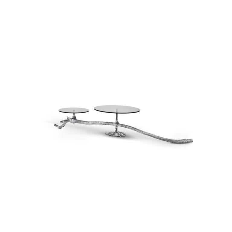 The Ramum Cake Stand is a perfect blend of artistry and practicality, designed to elevate any occasion with its refined silver finish and nature-inspired aesthetic. 

Drawing inspiration from the intricate patterns of tree branches, the stand