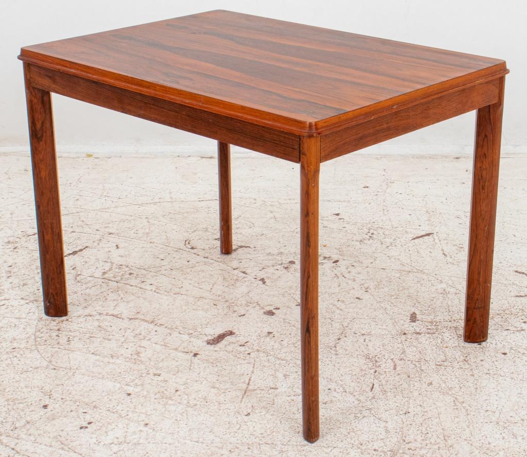 Scandinavian Modern rosewood side table or end table by Rasmus Solberg Norway, raised on tapered legs, with maker label to underside. Measures: 20.25
