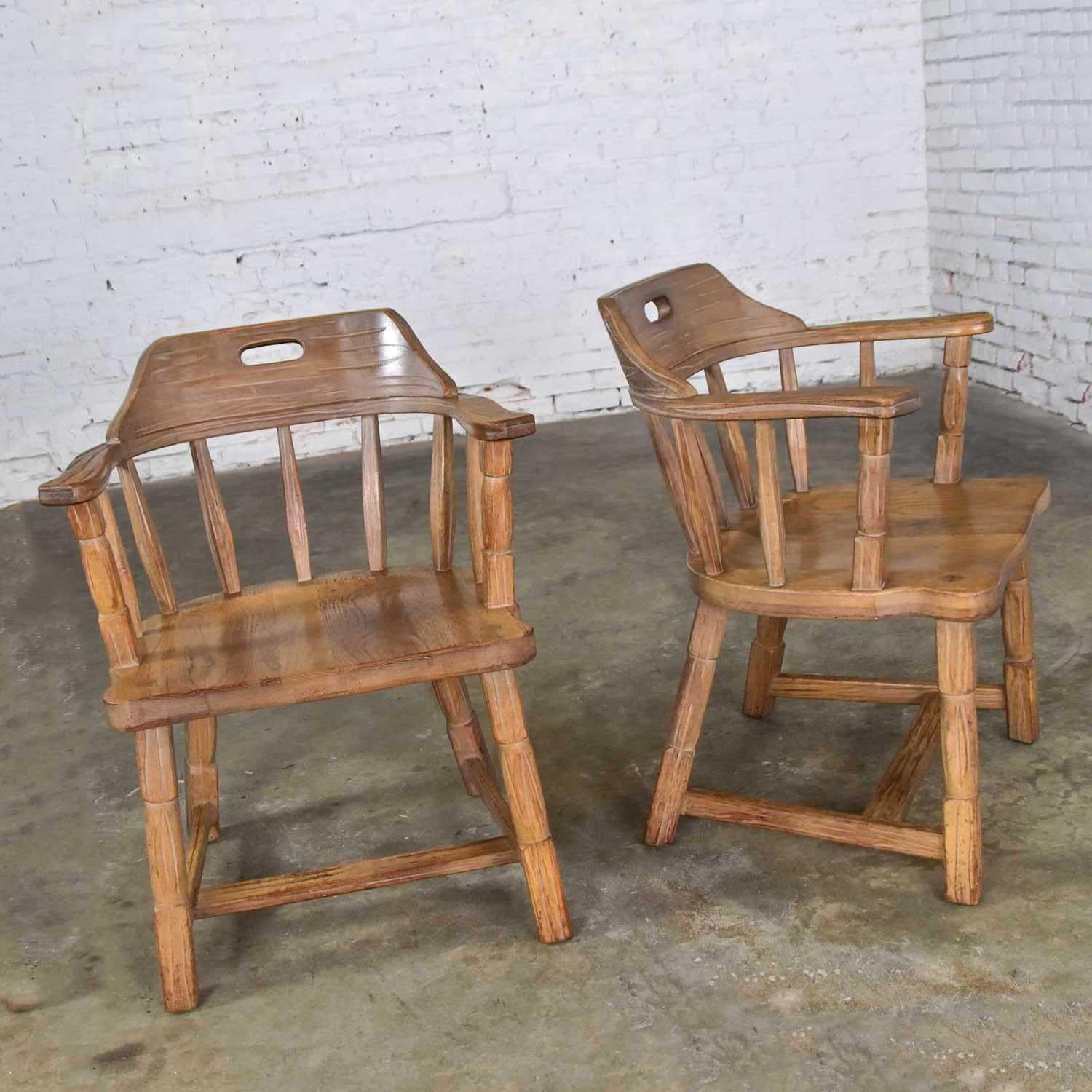 Wonderful pair of captains’ armchairs by A. Brandt comprised of solid ranch oak with natural oak finish. Gorgeous vintage condition with no outstanding flaws. Please see photos, circa mid-20th century.

Just look at these wonderful Captain’s