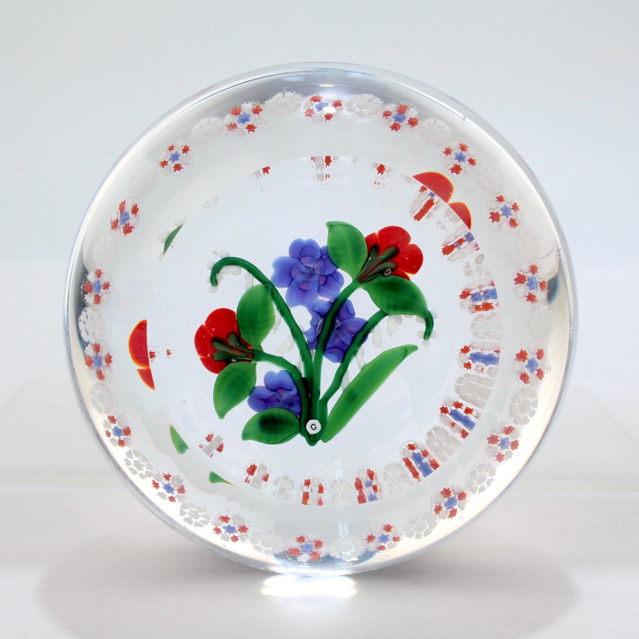 American Randall Grubb Flat Flower Bouquet Glass Paperweight with a Millefiori Garland For Sale