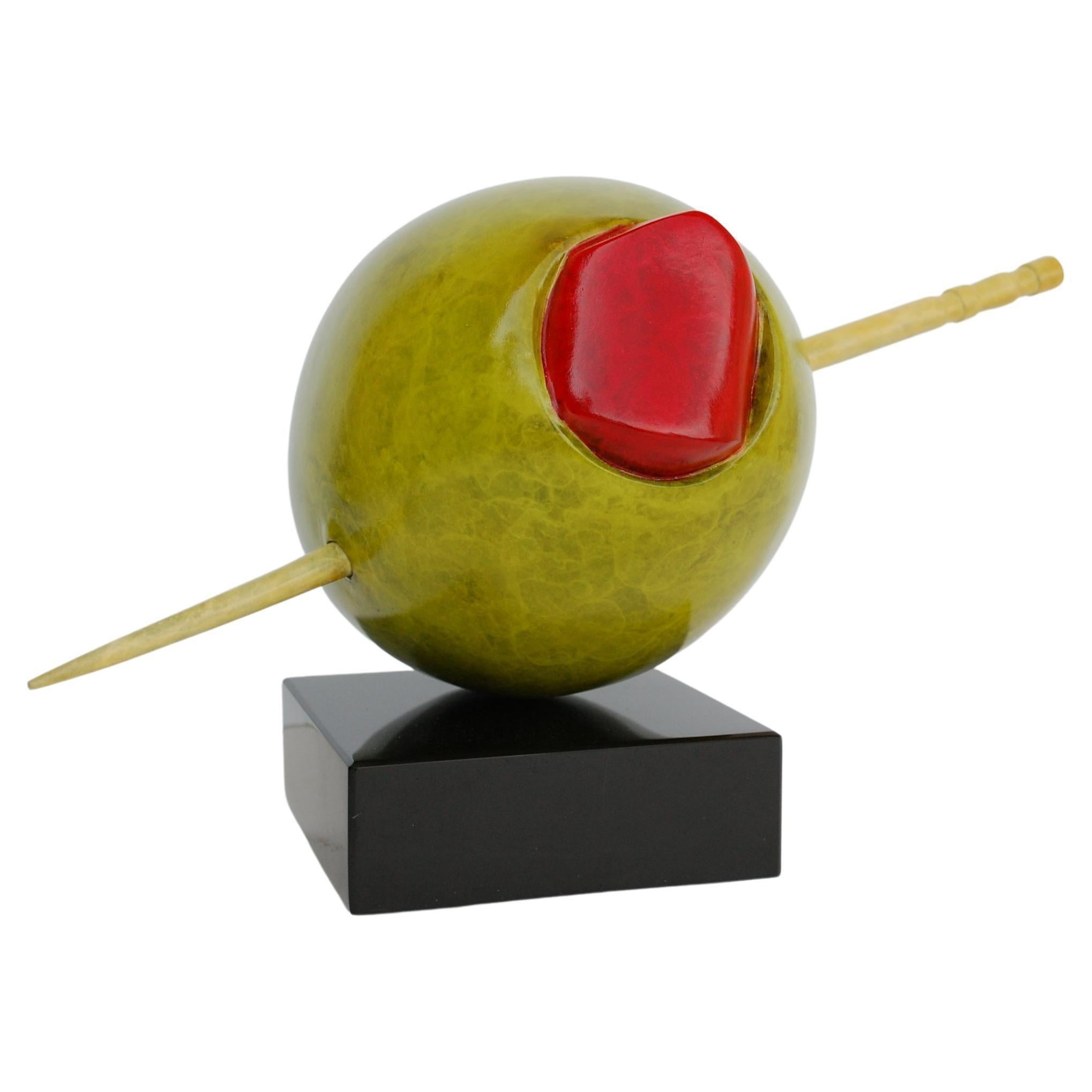 Oliva verde
Firmado por el artista, bronce patinado sobre base de mármol negro 6 