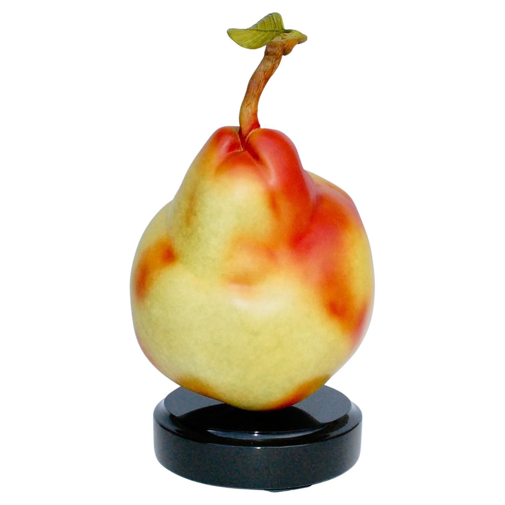 Pear 
Artist signed, patinated bronze on black marble base 8