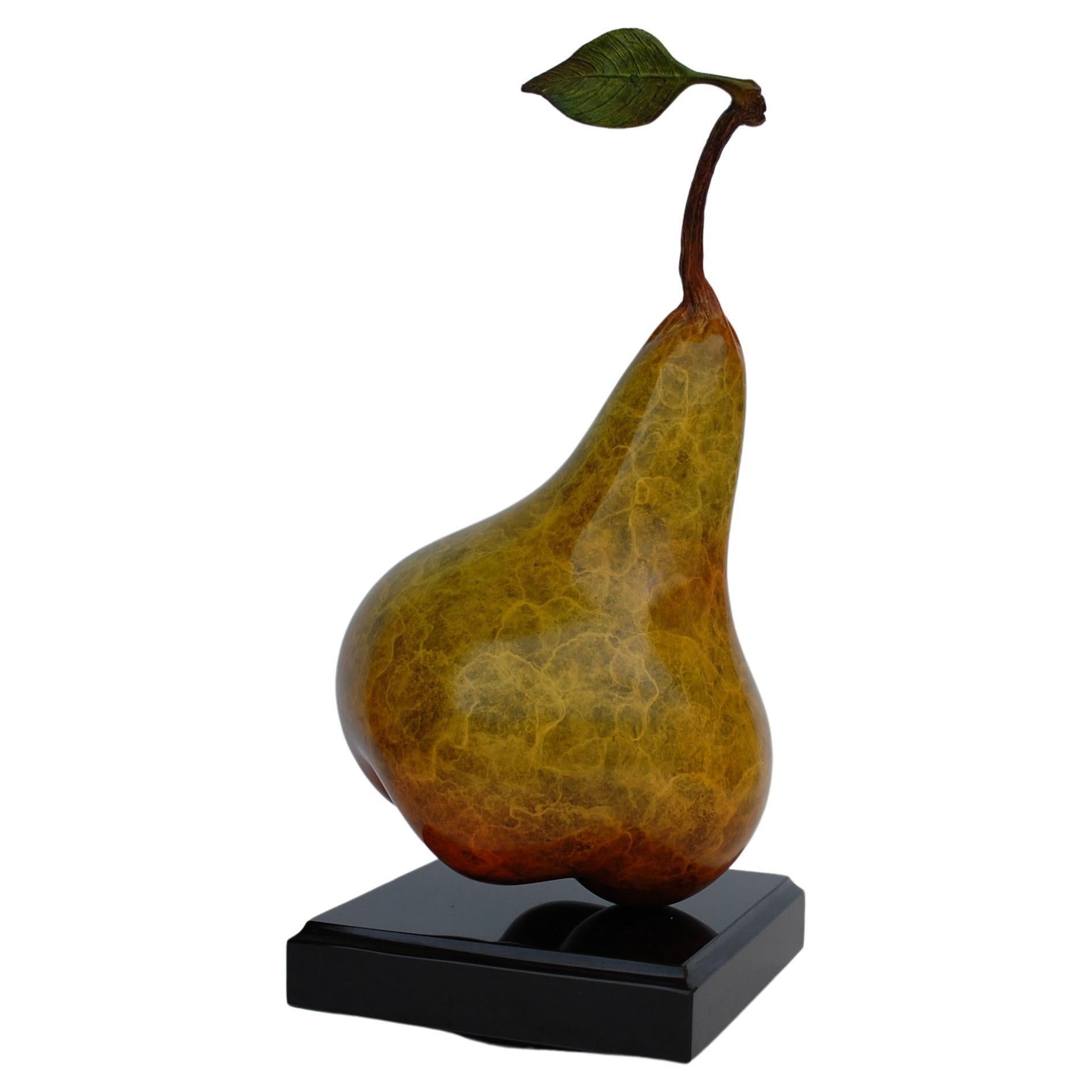 Pear with a leaf.
Artist signed, patinated bronze, on black marble base 8