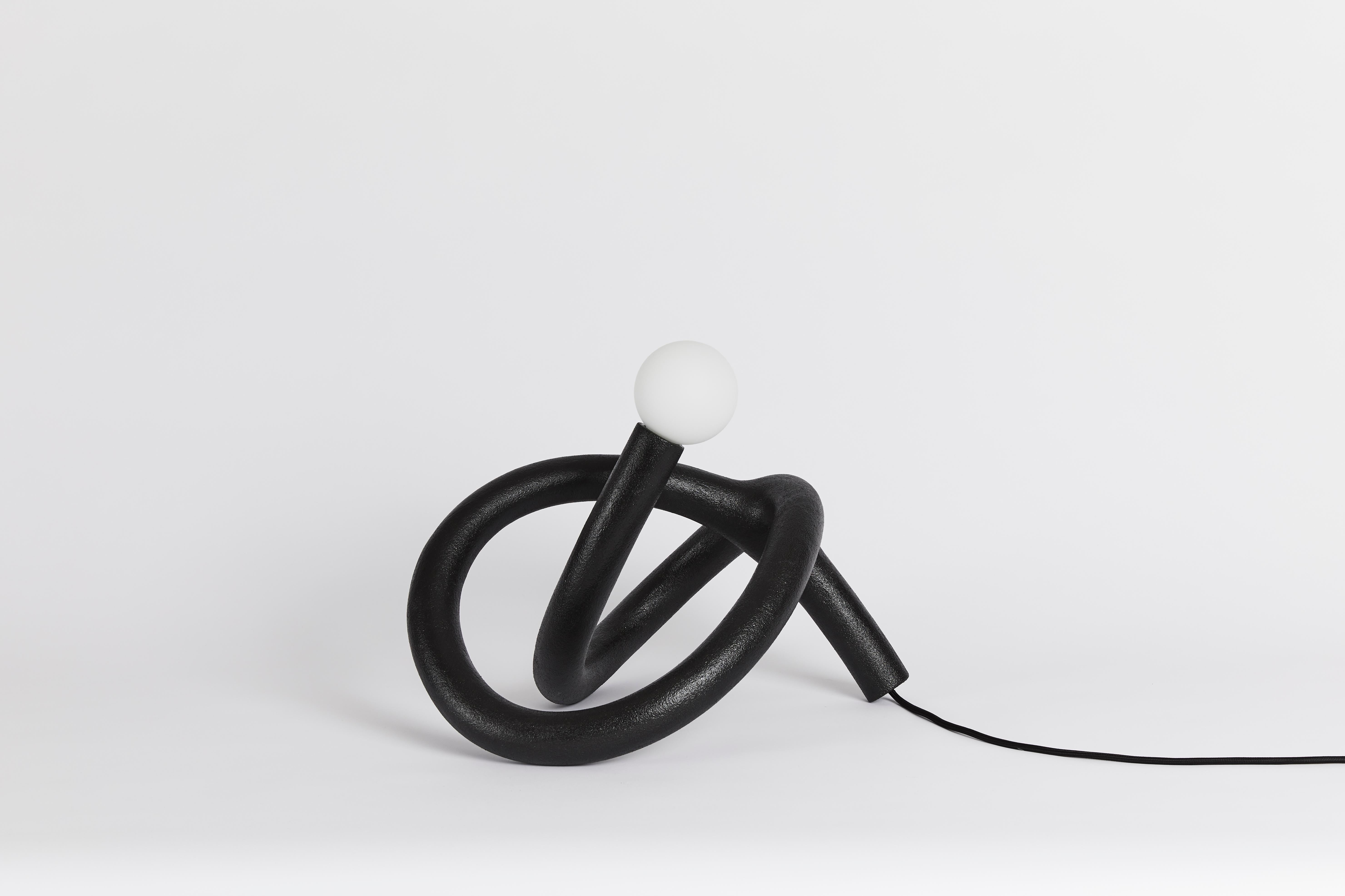 Random desk light by HWE
Limited edition
Materials: Waste SLS 3D nylon powder, sand from sustainable sources
Dimensions: W 33 x L 47 x  H 34 cm 
Colour: Anthracite
Also available in: Lemon, cream, aqua, grey, pink

All our lamps can be wired