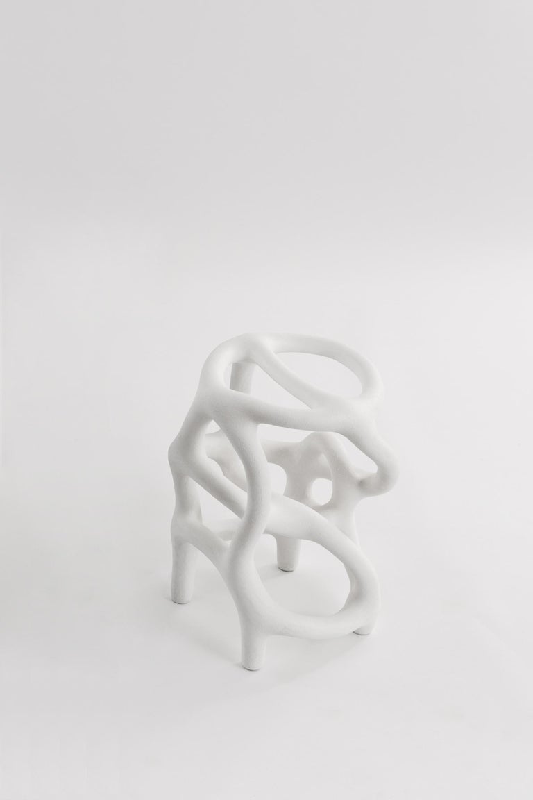 Random stool by HWE
Limited Edition
Materials: Waste SLS 3D nylon powder, Sand from sustainable sources
Dimensions: H 46 x W 30 x D 30 cm 
Colours: black, white, cream, terracotta, mint

Hot Wire Extensions is a young sustainable design brand,