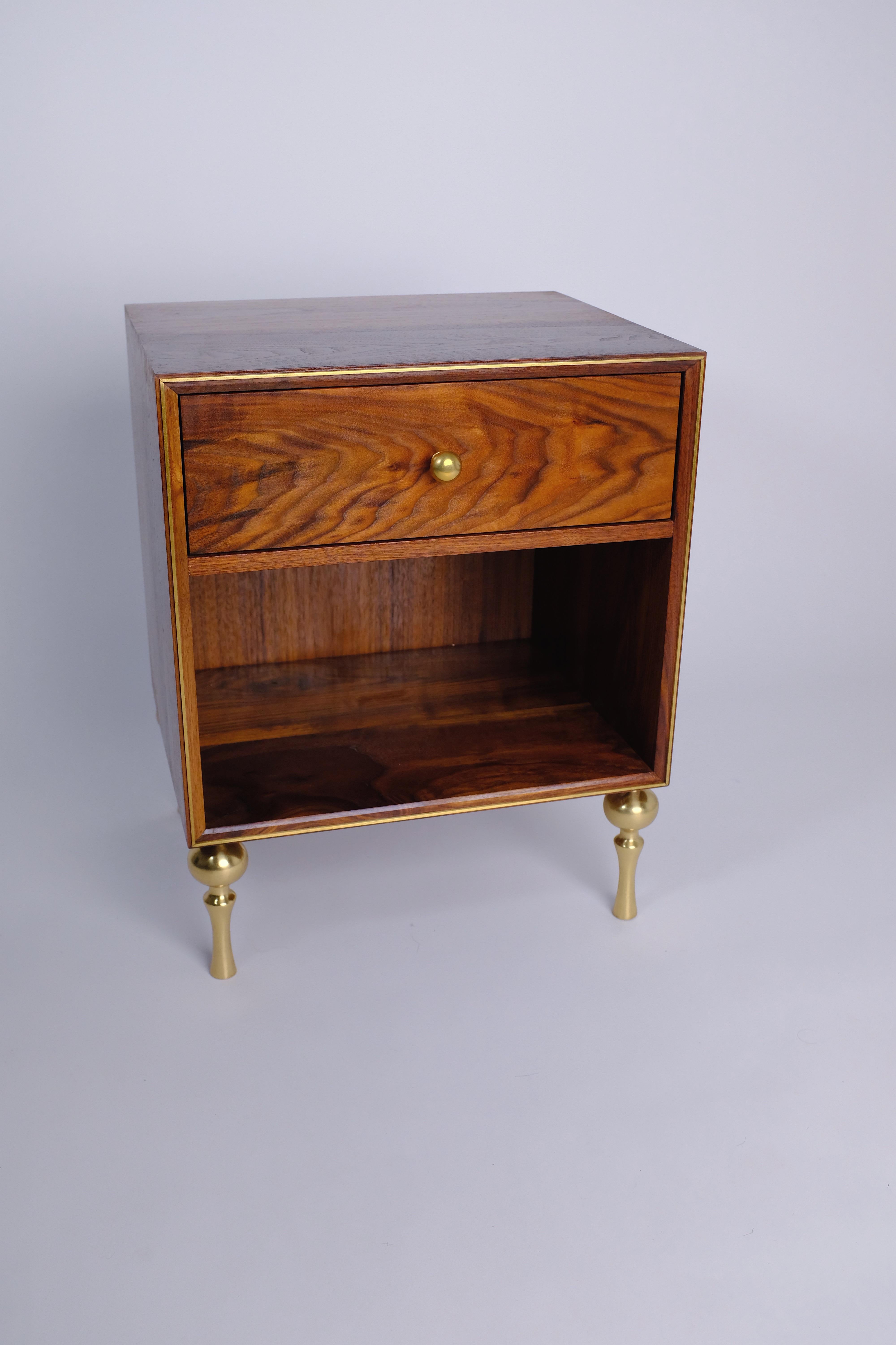 Nightstands pictured in oiled walnut, and polished brass inlay and polished brass legs to match. Drawer made in solid white oak.