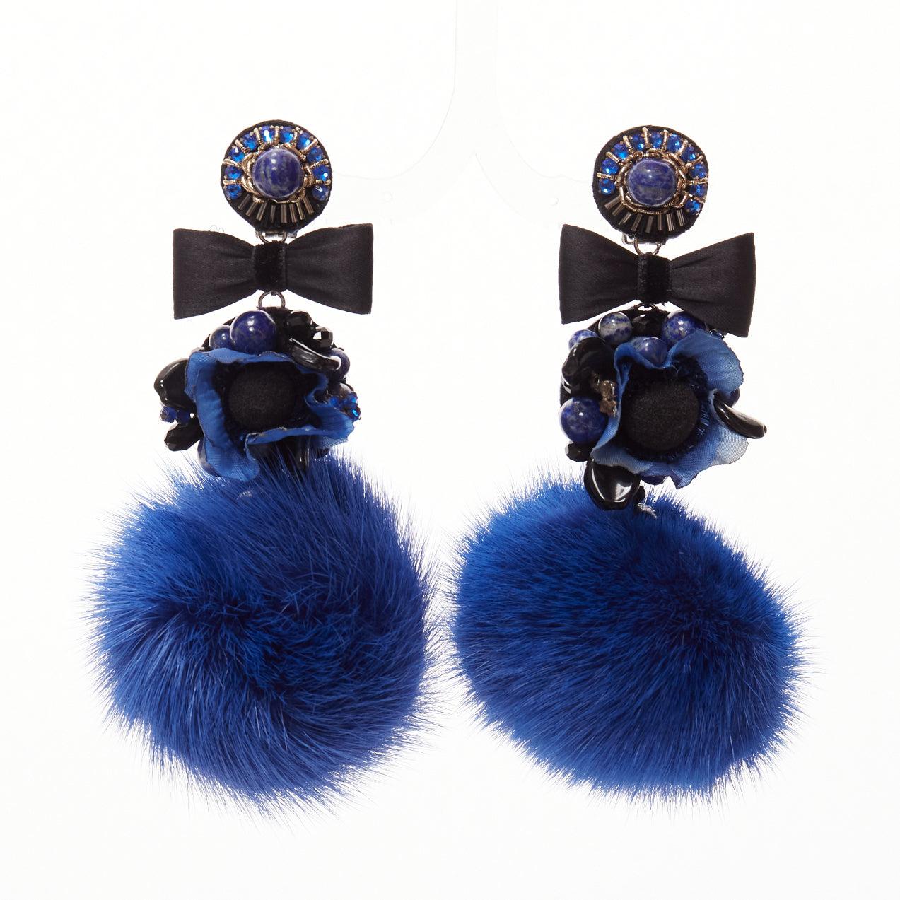 RANJANA KHAN blue black real fur crystal dangling clip on earrings
Reference: AAWC/A01218
Brand: Ranjana Khan
Material: Fur, Fabric
Color: Blue, Black
Pattern: Solid
Closure: Clip On
Lining: Blue Leather
Extra Details: Blue leather