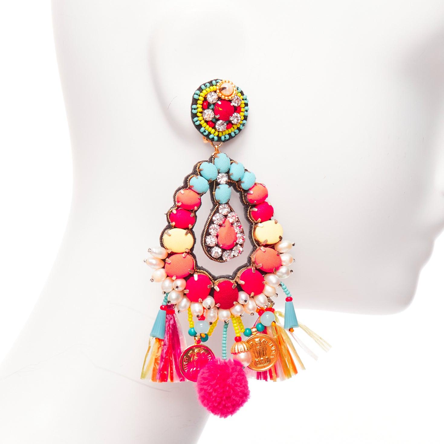 RANJANA KHAN neon orange crystal beads multi dangling clip on earrings
Reference: AAWC/A01216
Brand: Ranjana Khan
Material: Fabric
Color: Neon Pink, Multicolour
Pattern: Solid
Closure: Clip On
Lining: Black Leather
Extra Details: Black leather back.