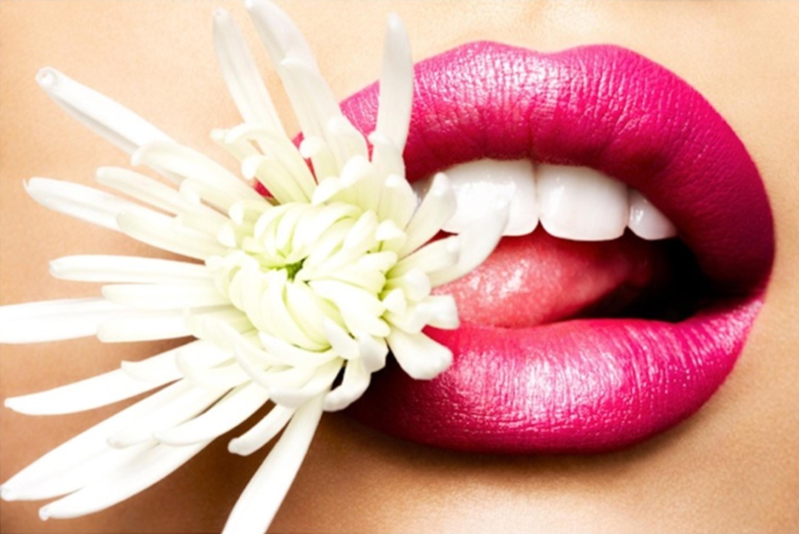 Rankin Color Photograph - Chrysanthemum Bitten - model with pink lips biting a white flower
