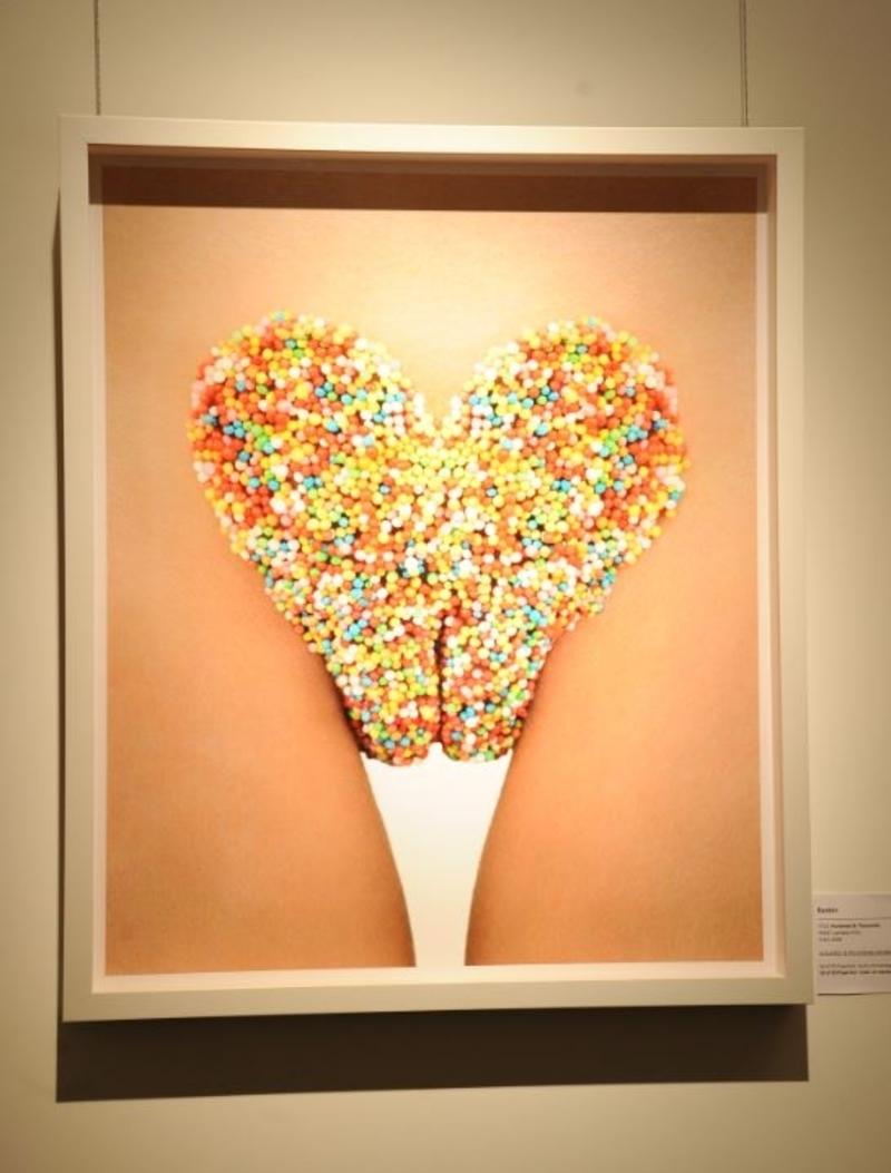 Hundreds & Thousands - Candies in shape of a heart are placed on a female nude - Photograph by Rankin