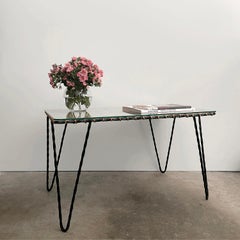 Raoul Guys Französischer Couchtisch aus Korbweide und Eisen