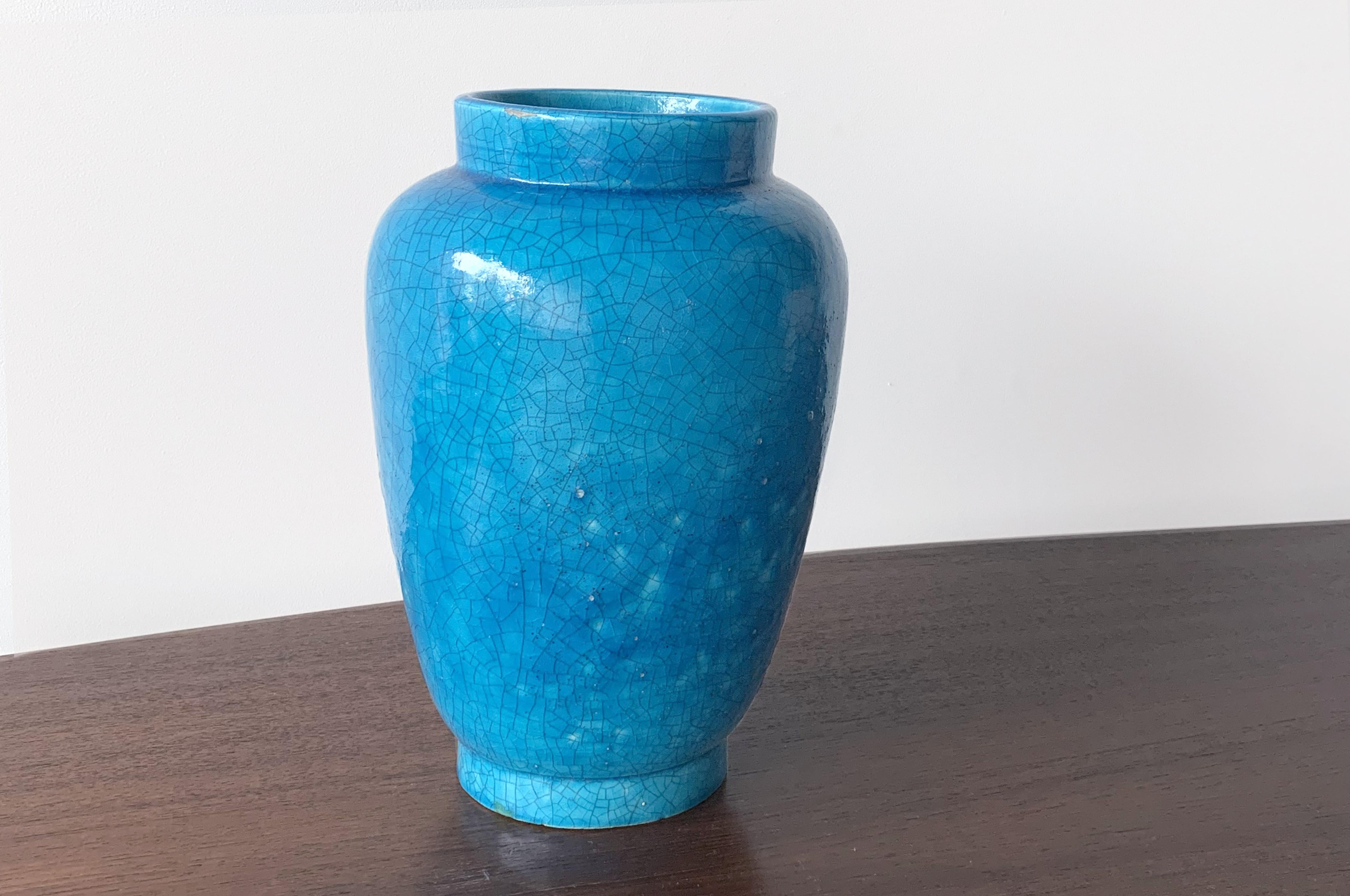 Turquoise crackle glaze ceramic vase.
Signed on base 'Lachenal'.