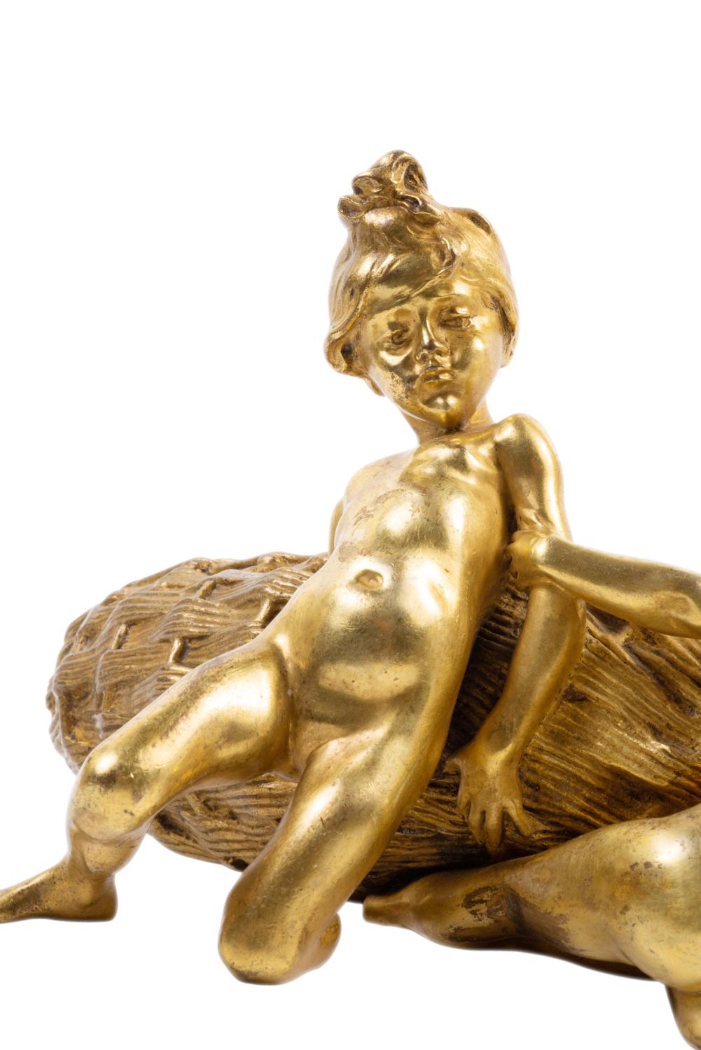 A good quality late 19th century French gilded ormolu group, depicting two bathing children playing with a fishing basket.

François-Raoul Larche (1860 Saint-André-de-Cubzac - 1912 Paris) was a French Art Nouveau sculptor whose work included several