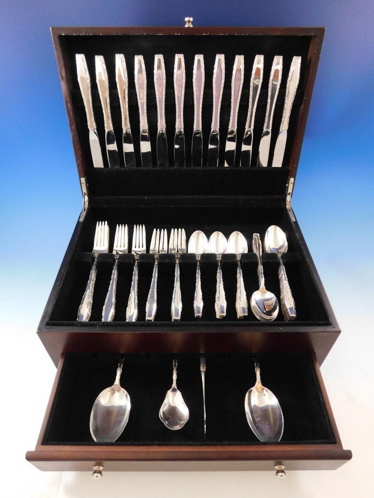 Heirloom quality Rapallo by Lunt sterling silver flatware set of 64 pieces. This set includes:

12 knives, 9