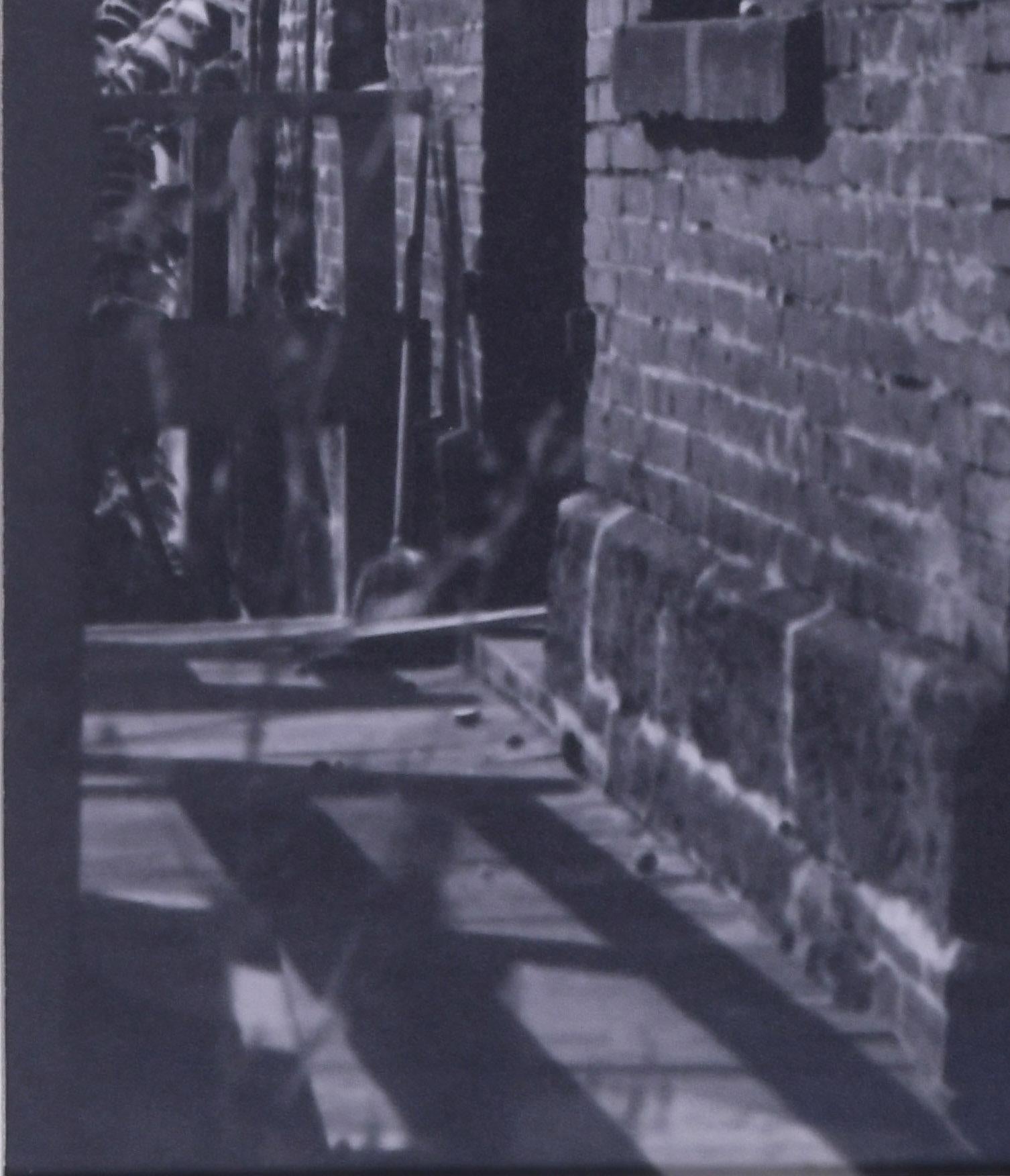 untitled (study of shadows and brick building) - Black Abstract Photograph by Raphael Gleitsman