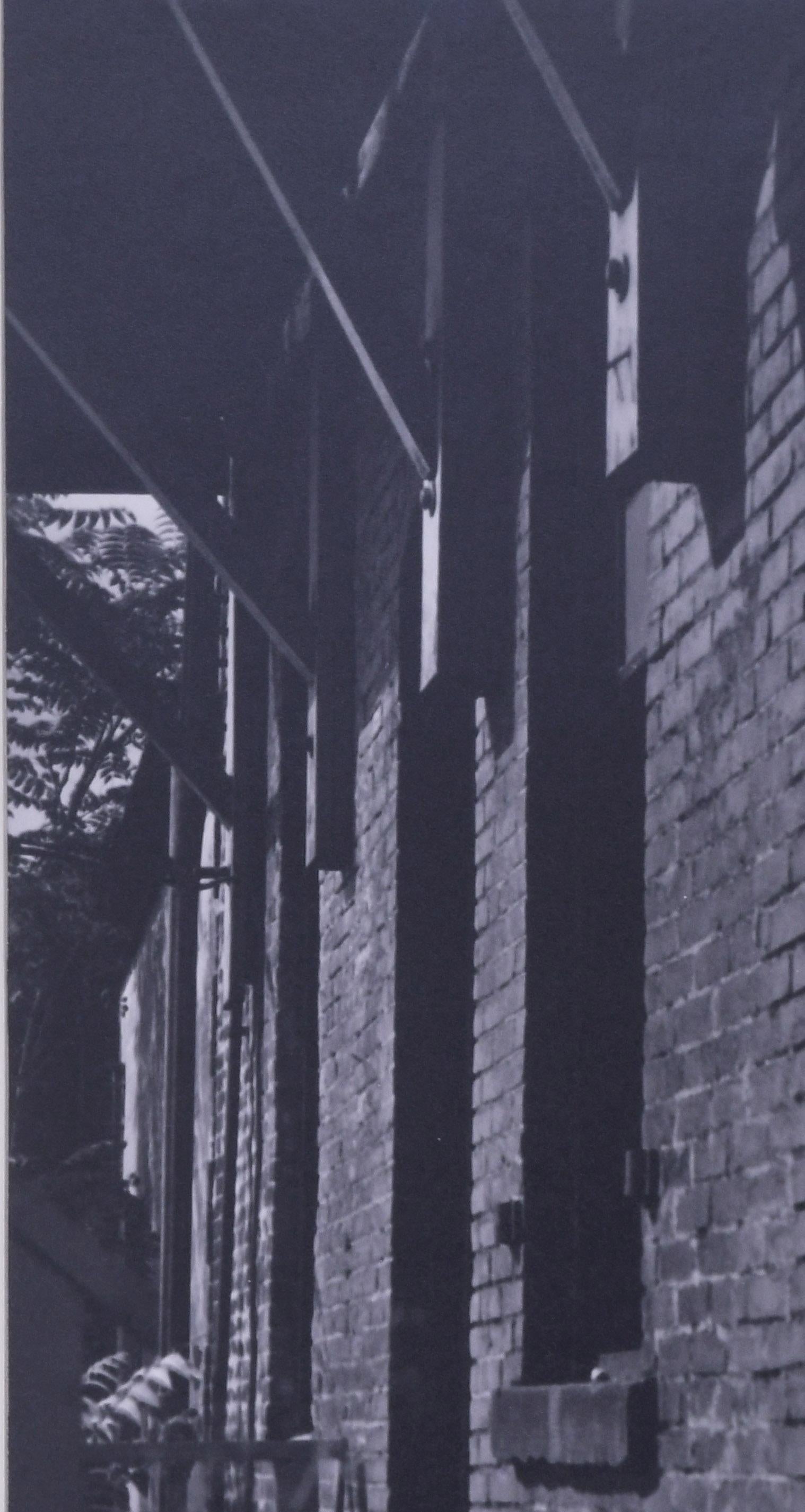 untitled (study of shadows and brick building)
Silver gelatin print, c. 1960-1965
Signed in pencil lower right on the mount (see photo)
Provenance: Gift of the Artist
                      Akron Art Museum, 30.93.TR
                      De-accessed