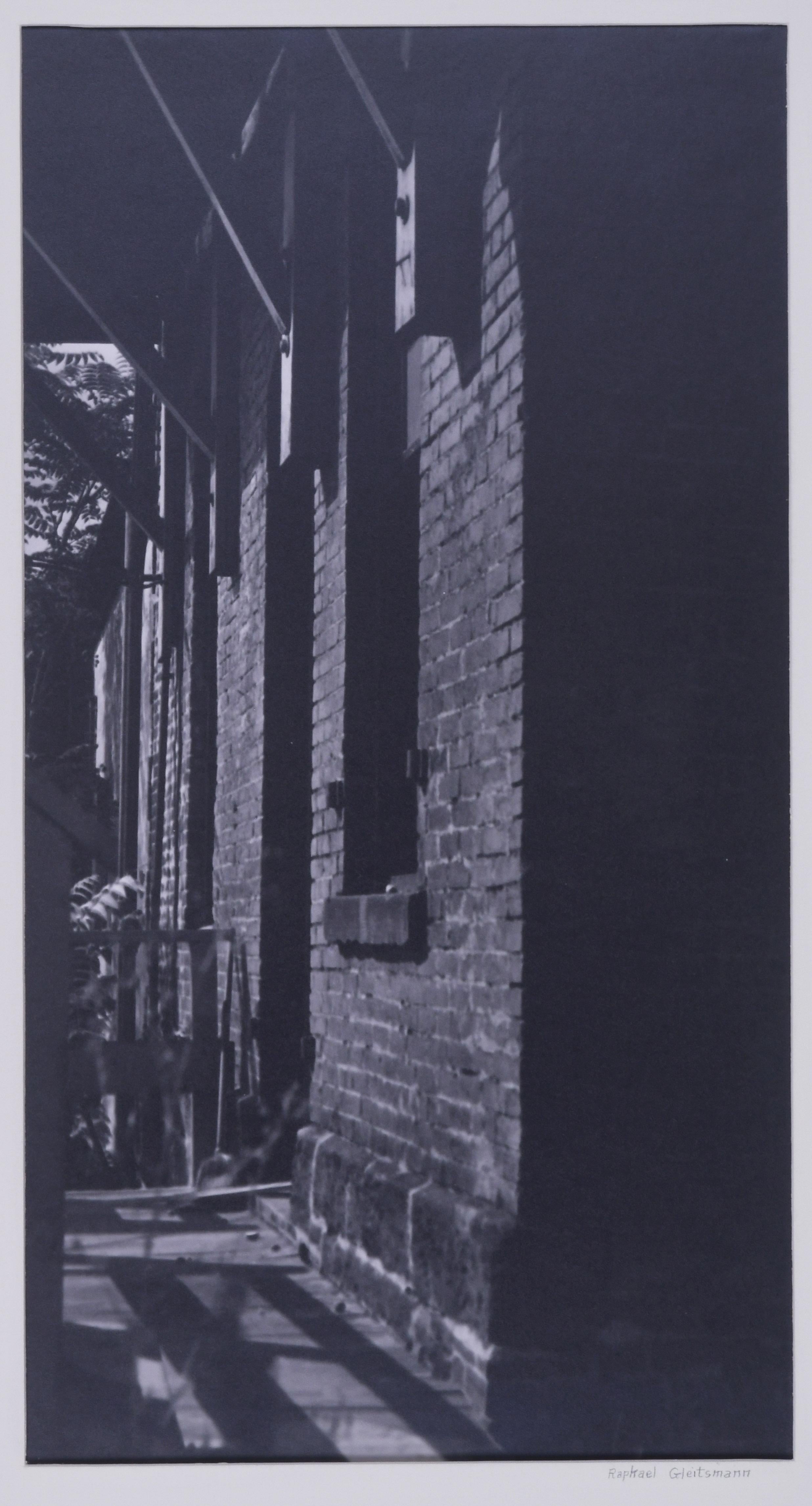 untitled (study of shadows and brick building)