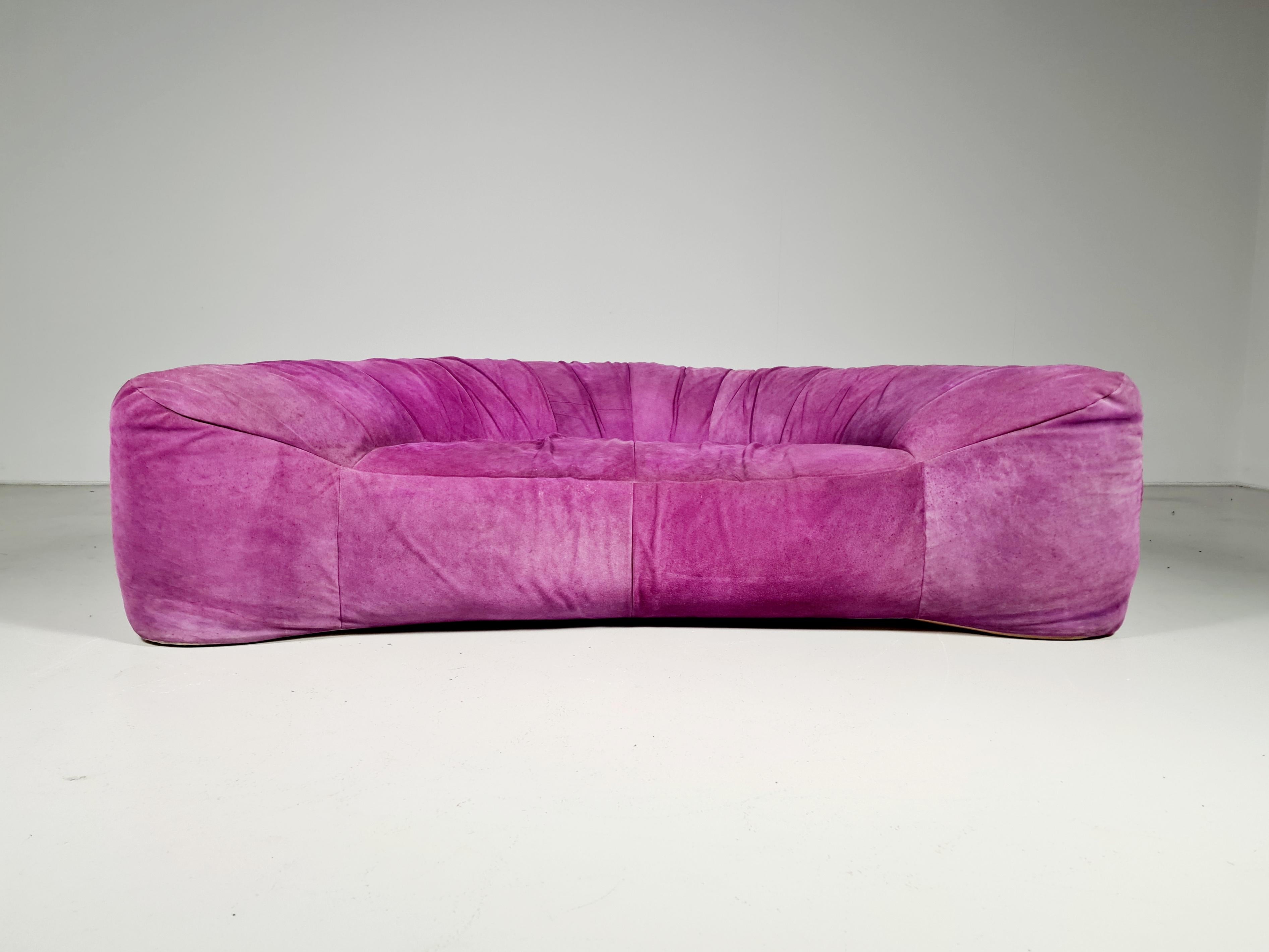 Vintage lounge sofa designed by Raphaël Raffel for Maison Honoré Paris in France. This sofa was produced on demand in the 1970s until the mid-1980s. Because of this, it is very rare. The organic form is reminiscent of a croissant.

It still has