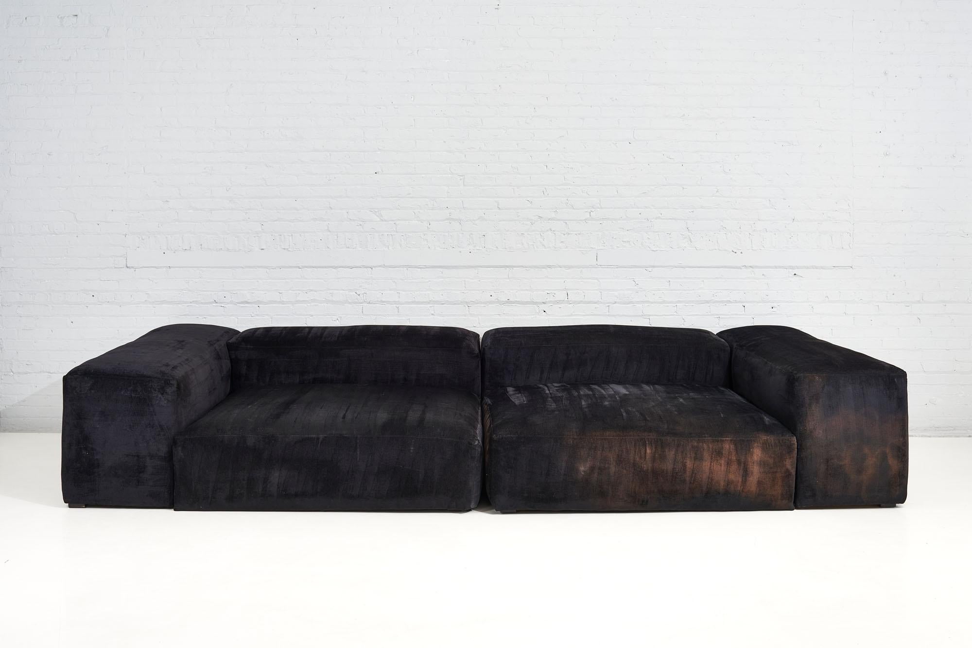 Raphael Raffel Monumental black sofa, 1980. Wear consistent with age and use, sun fading and discoloration.
