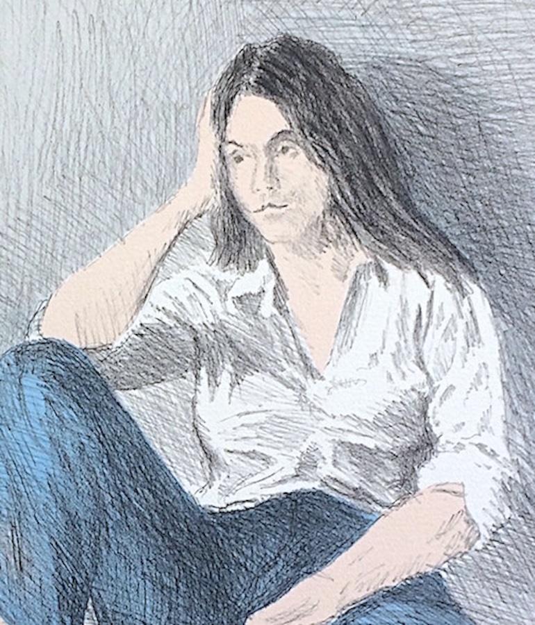 seated woman in pink blouse