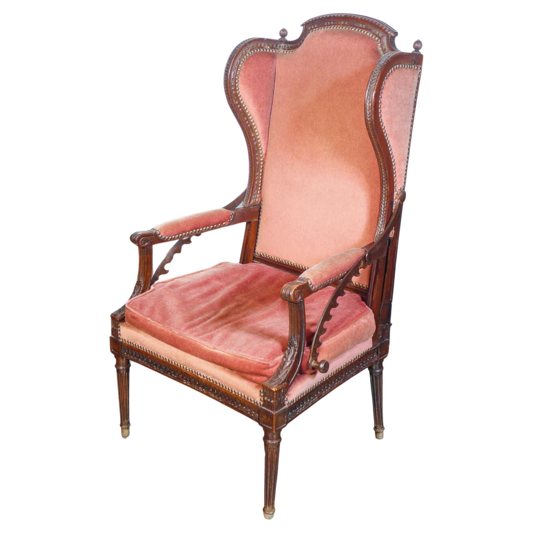 Rare Directoire-style recliner armchair in walnut wood. Late eighteenth century For Sale