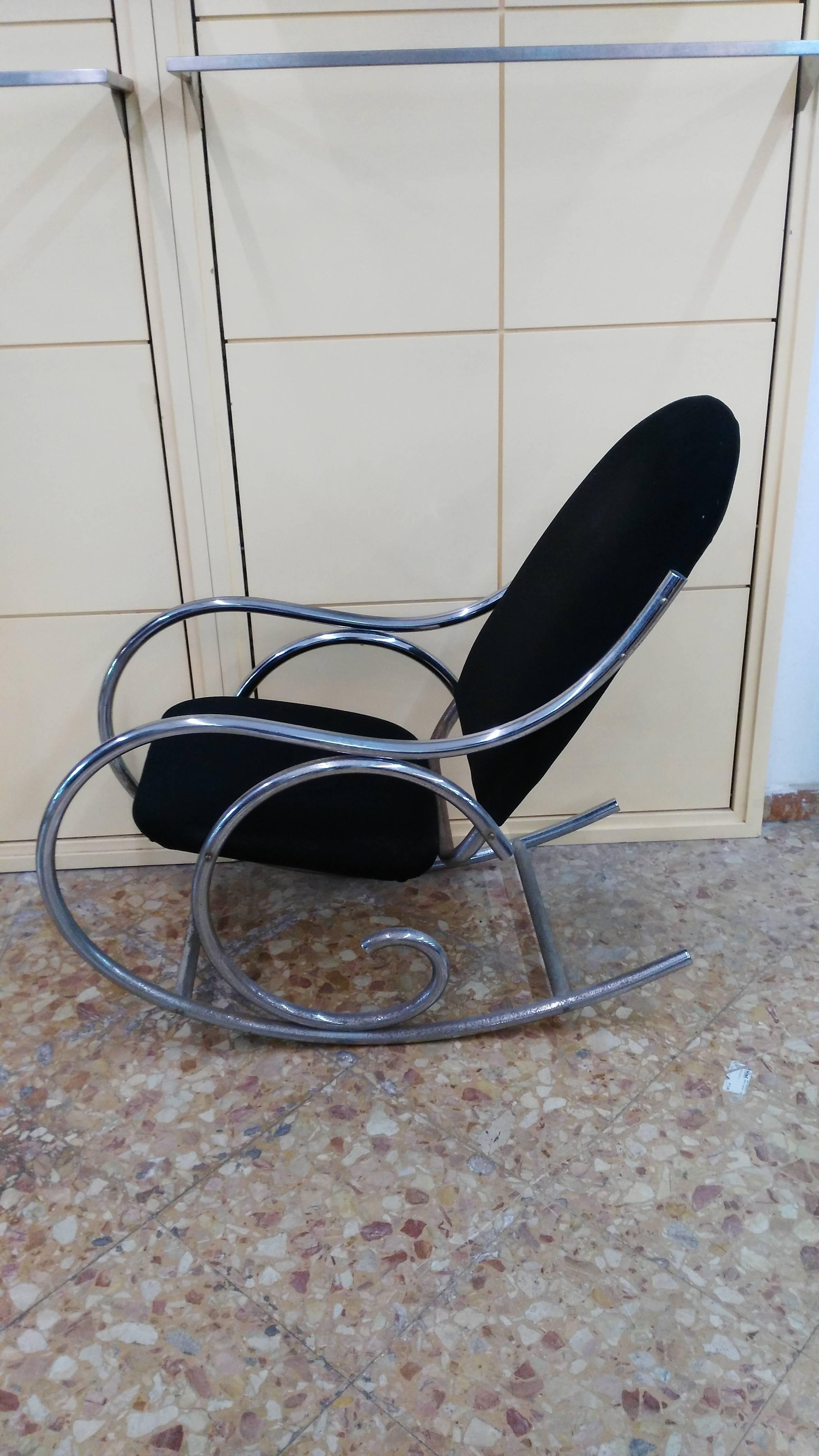 Unobtainable rocking chair
1970s
chromed steel frame with seat and back in black fabric and foam padding.