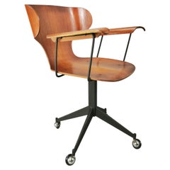 rara silla de oficina de madera curvada años 50/60