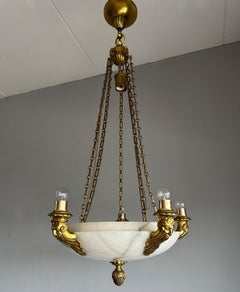 Raro candelabro de 11 luces de bronce dorado y alabastro de gran pantalla c. Esculturas de ogros