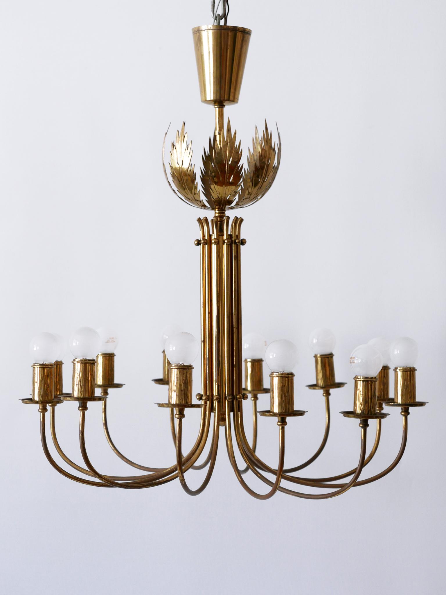 Rare 12-Armed Brass Chandeliers or Pendant Lamps by Vereinigte Werkstätten 1950s In Good Condition For Sale In Munich, DE