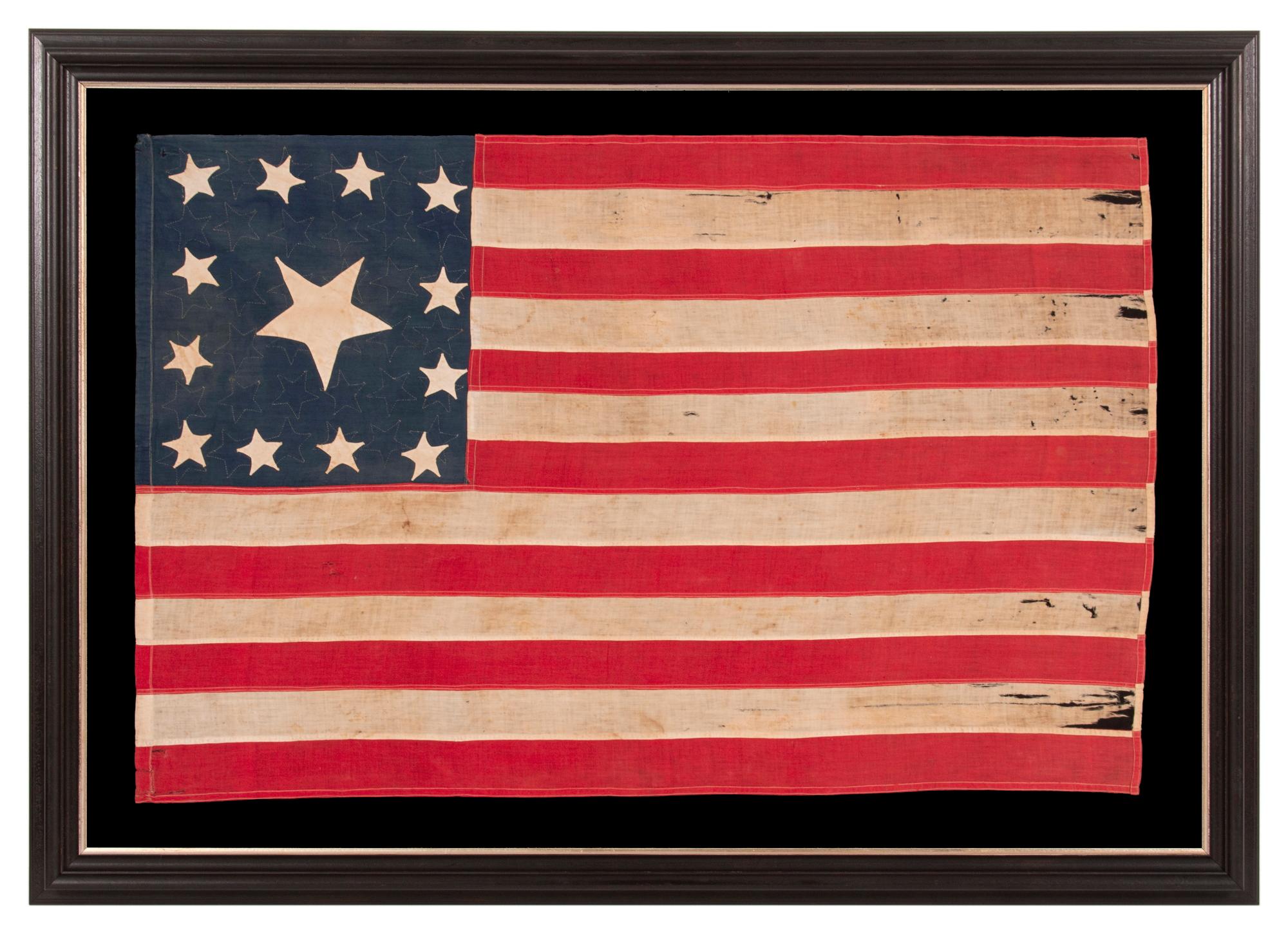 bandera totalmente cosida a mano con un águila federal aplicada y 14 estrellas, fabricada en la década de 1850 por la renombrada fabricante de banderas SARAH McFADDEN, 