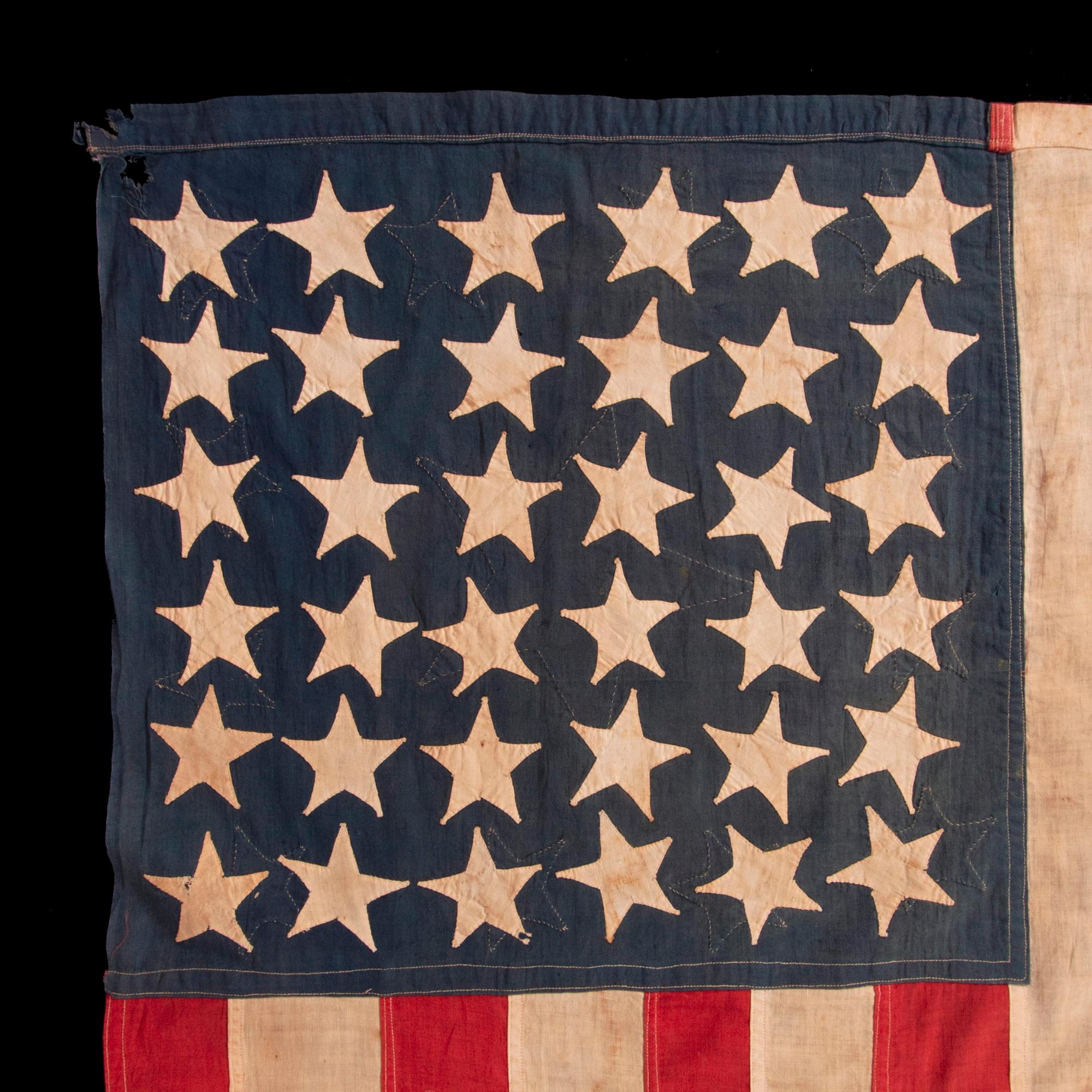 Bandera de 14 estrellas, cosida a mano, con águila aplicada, hecha por Sarah McFadden, hacia 1852-73 en venta 1
