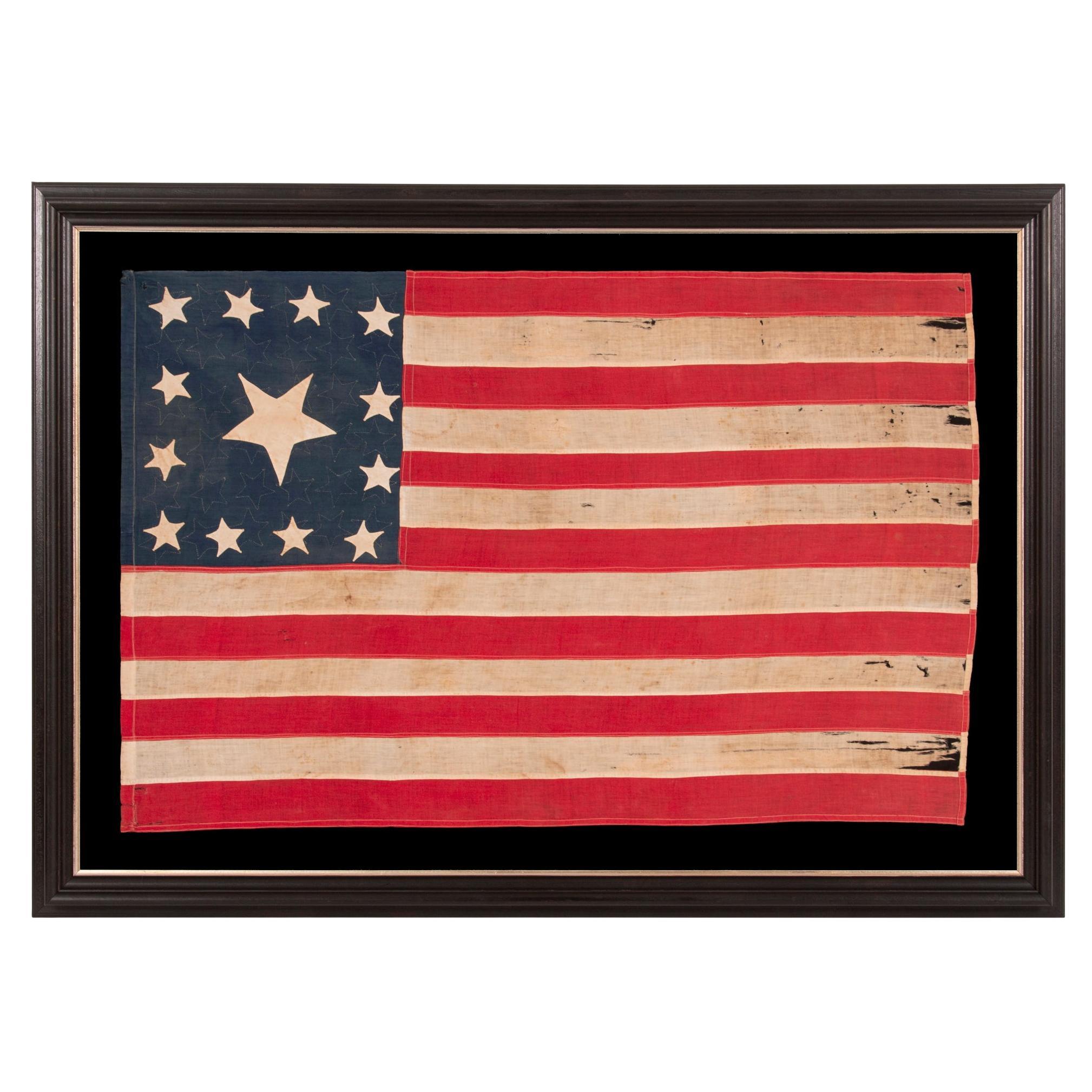 Bandera de 14 estrellas, cosida a mano, con águila aplicada, hecha por Sarah McFadden, hacia 1852-73 en venta