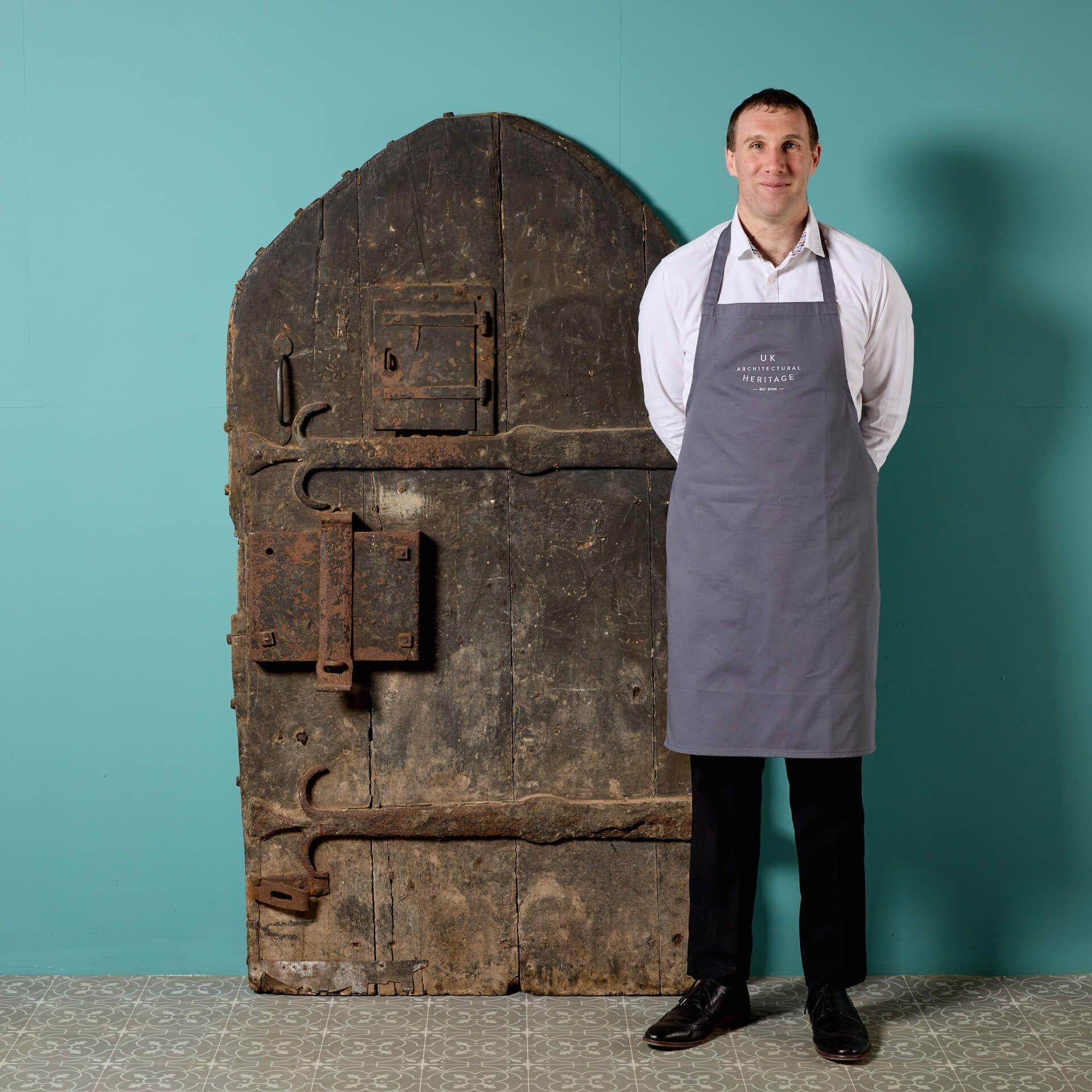 A substantially constructed, heavy medieval era English oak door possibly dating from as early as the 13th century. This 800-year-old door is a rare find and originates from Leominster – perhaps it once stood as an entrance into the halls of the