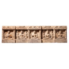 Rare 14th century sandstone panel with five Buddha statues from India